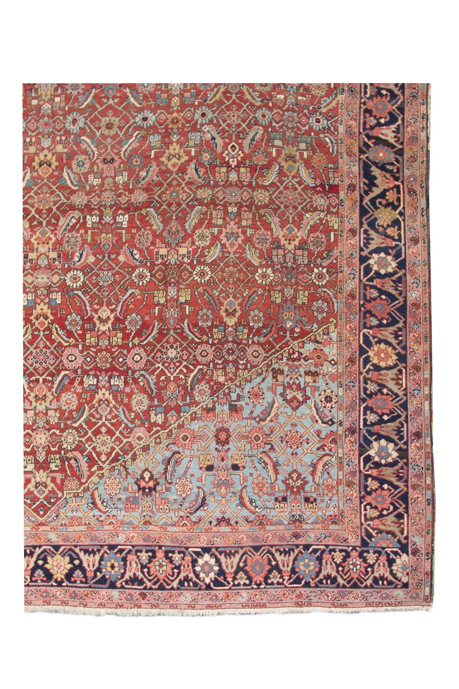 Antique Persian Heriz Long Rug, c. 1900

This extraordinary Heriz carpet from Northwest Persia uses a small-scale intricate lattice design composed of alternating blossoms, rosettes, and foliage known as the Herati ­pattern. While maintaining the
