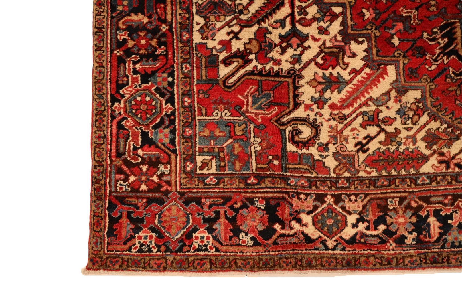Behold the allure of our Heriz rug, a captivating masterpiece that effortlessly marries tradition and contemporary style. This rug boasts a rich red background, setting the stage for an intricate and visually striking design that will undoubtedly