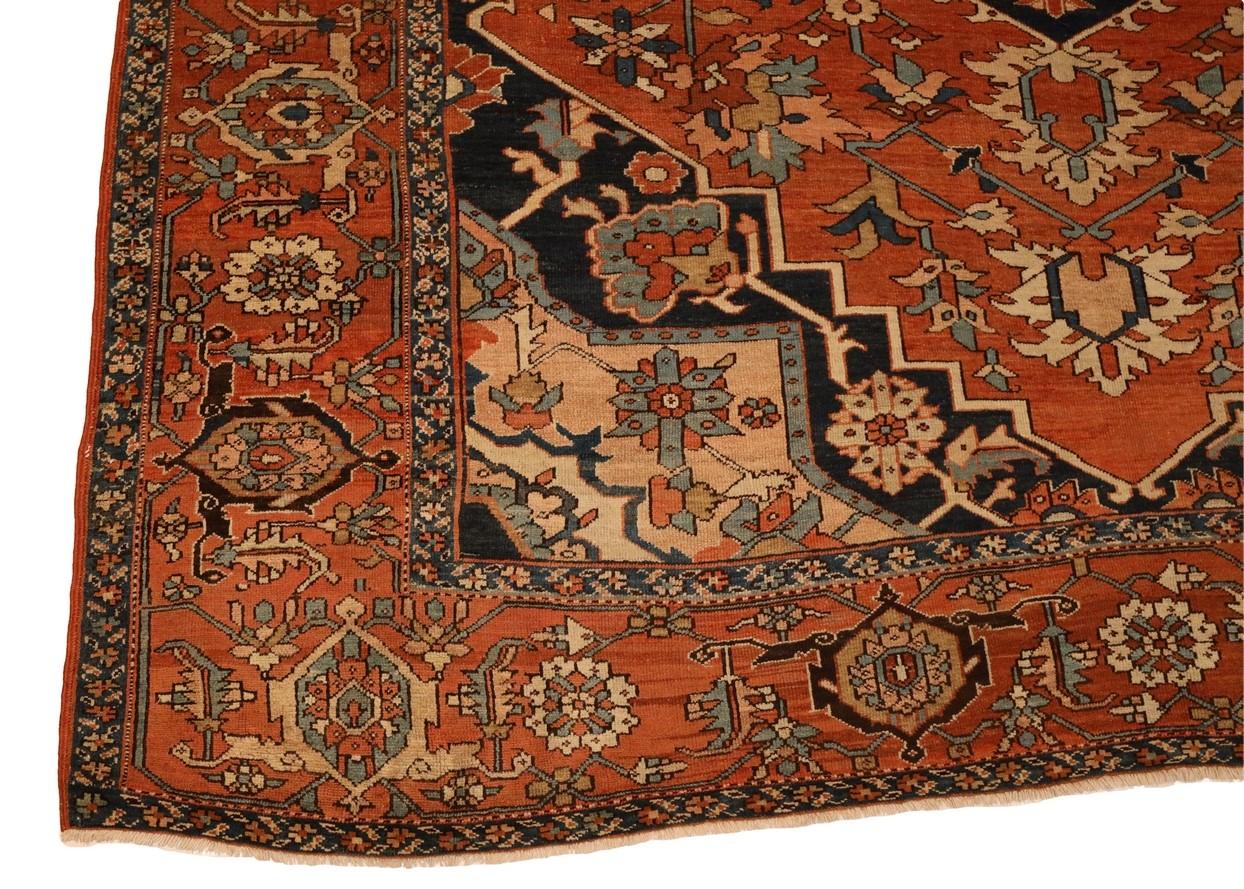 Indulge yourself in the captivating allure of the Heriz rug, a masterpiece of artistic craftsmanship and timeless elegance. This magnificent rug beckons with its radiant red background, which boasts a deep and aged hue, reminiscent of a rich ruby or