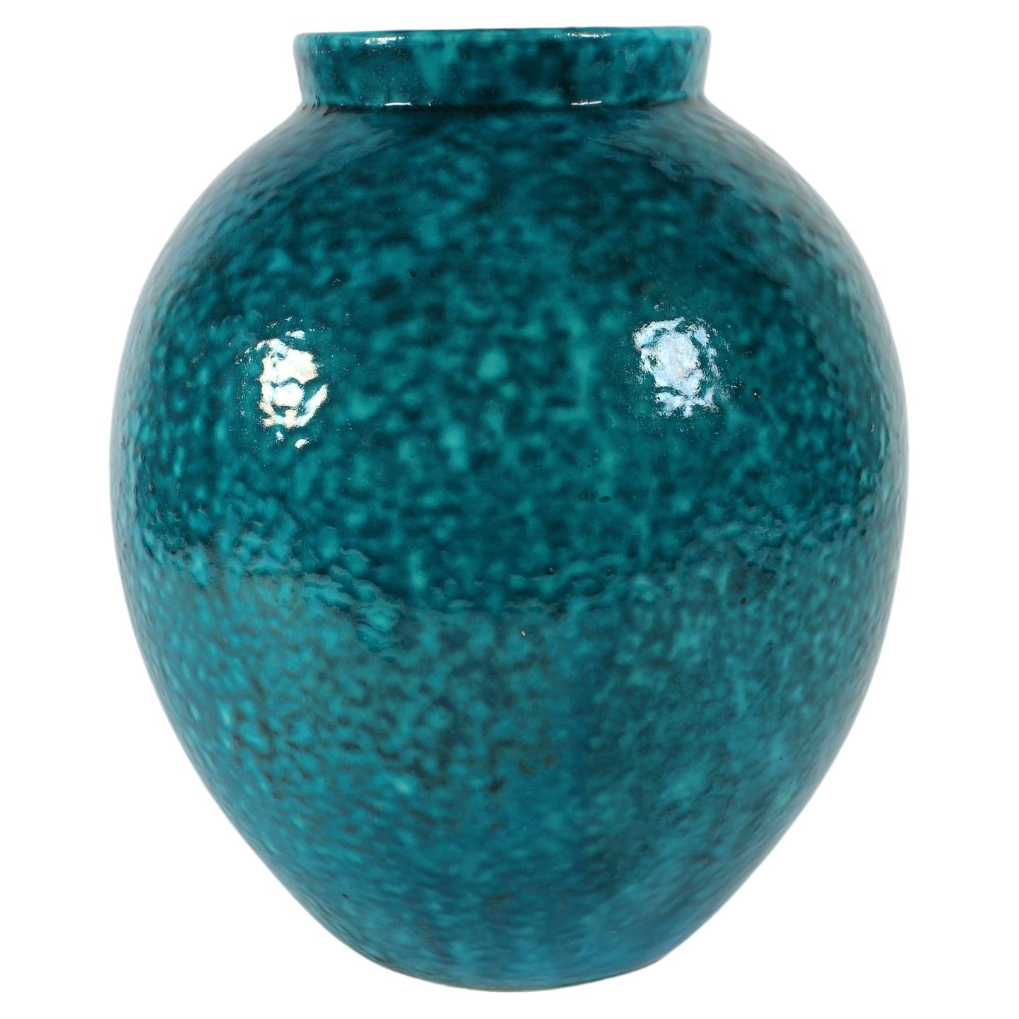 Danish Art Deco ceramic floor vase by the workshop Herman August Kähler (HAK). Made in the 1930s. 

The ceramic vase is decorated with glossy speckled turquoise glaze.

Hand-marked on bottom: HAK

Very good condition - no chips, cracks or