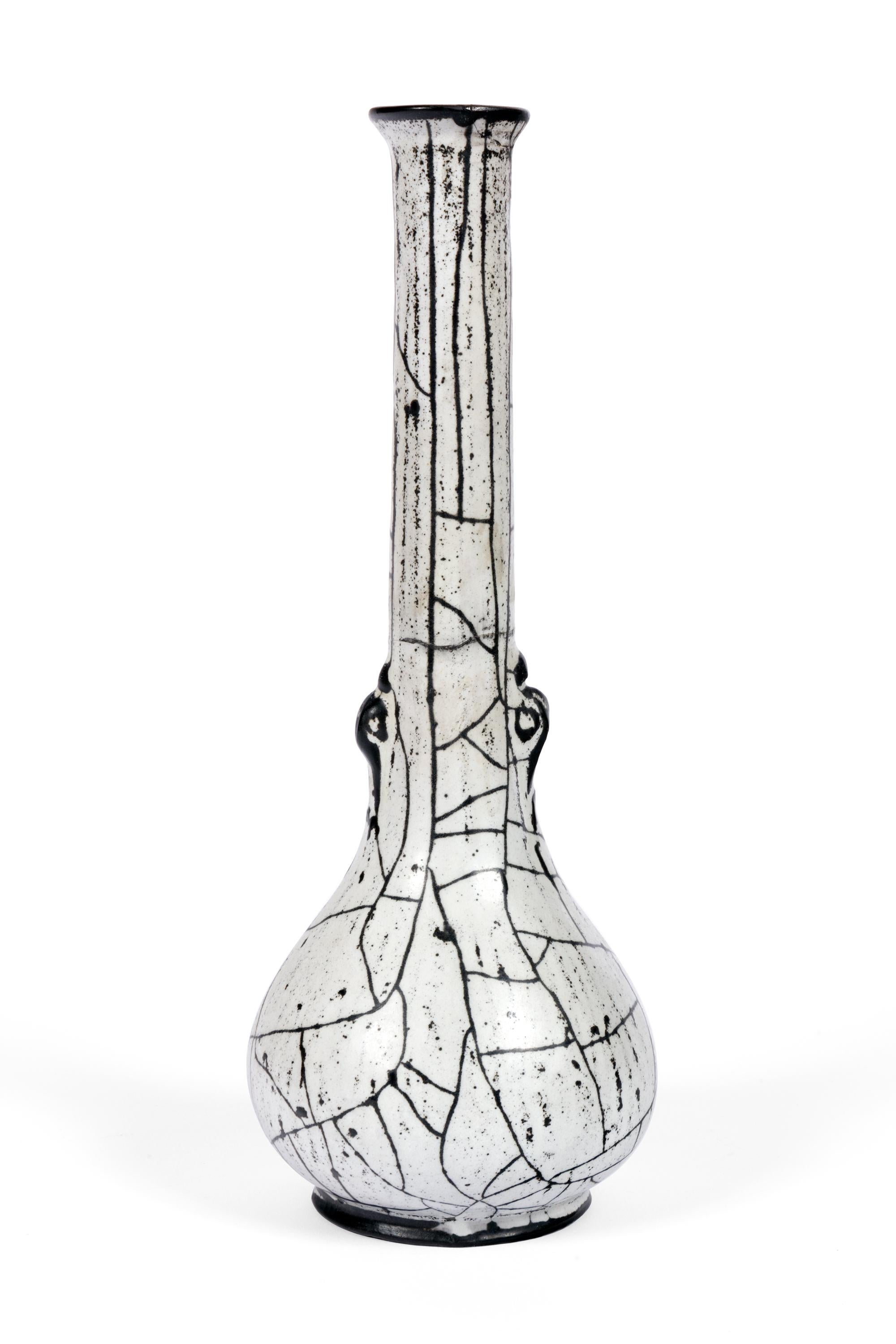 A lovely vase with a fascinating glaze by Svend Hammershoj for Herman A. Kahler.