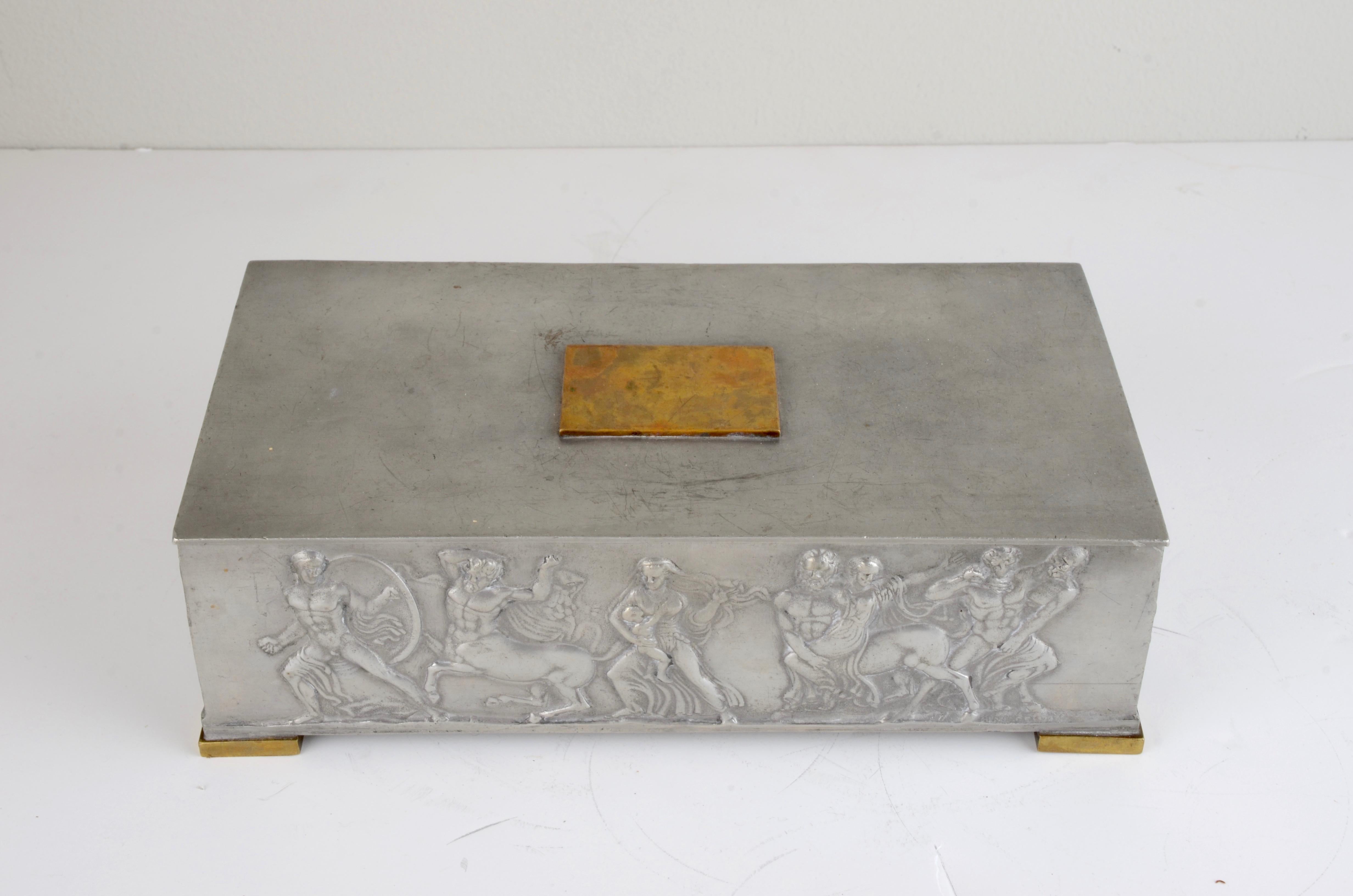 Box in pewter and brass by Herman Bergman Konstgjuteri, Stockholm 1940 (O8). Figurative motifs. Wood insert.