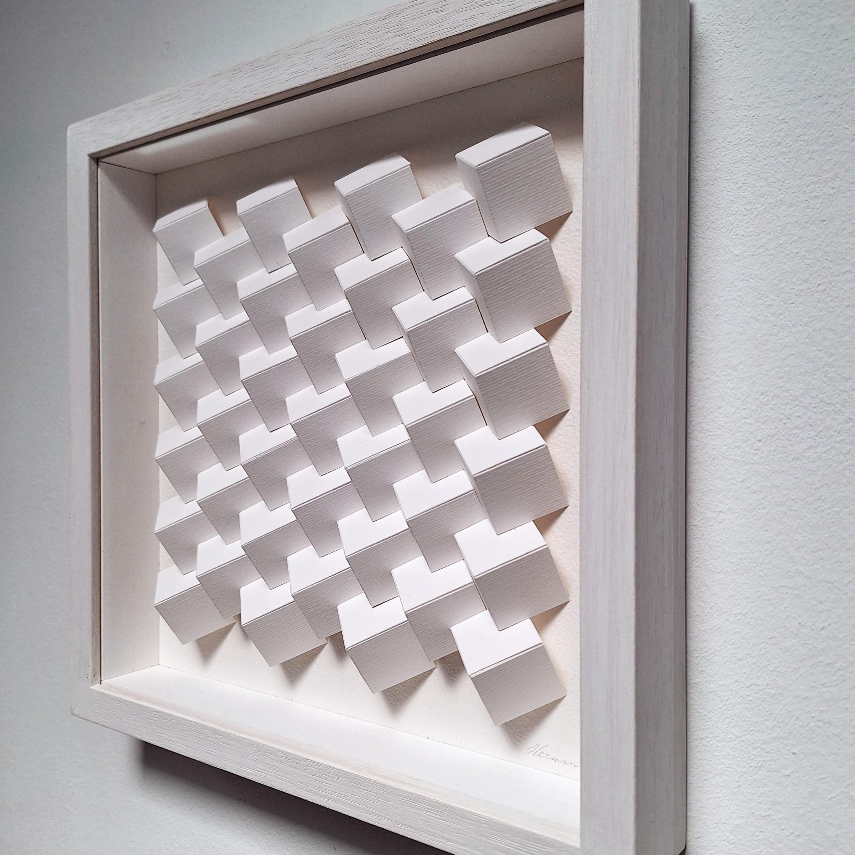 No. 221210 est une petite peinture moderne en relief contemporaine unique en son genre de l'artiste néerlandais Hewrman Coppus. Le relief est constitué d'éléments en papier cartonné blanc méticuleusement découpés à la main, pliés et collés, qui sont