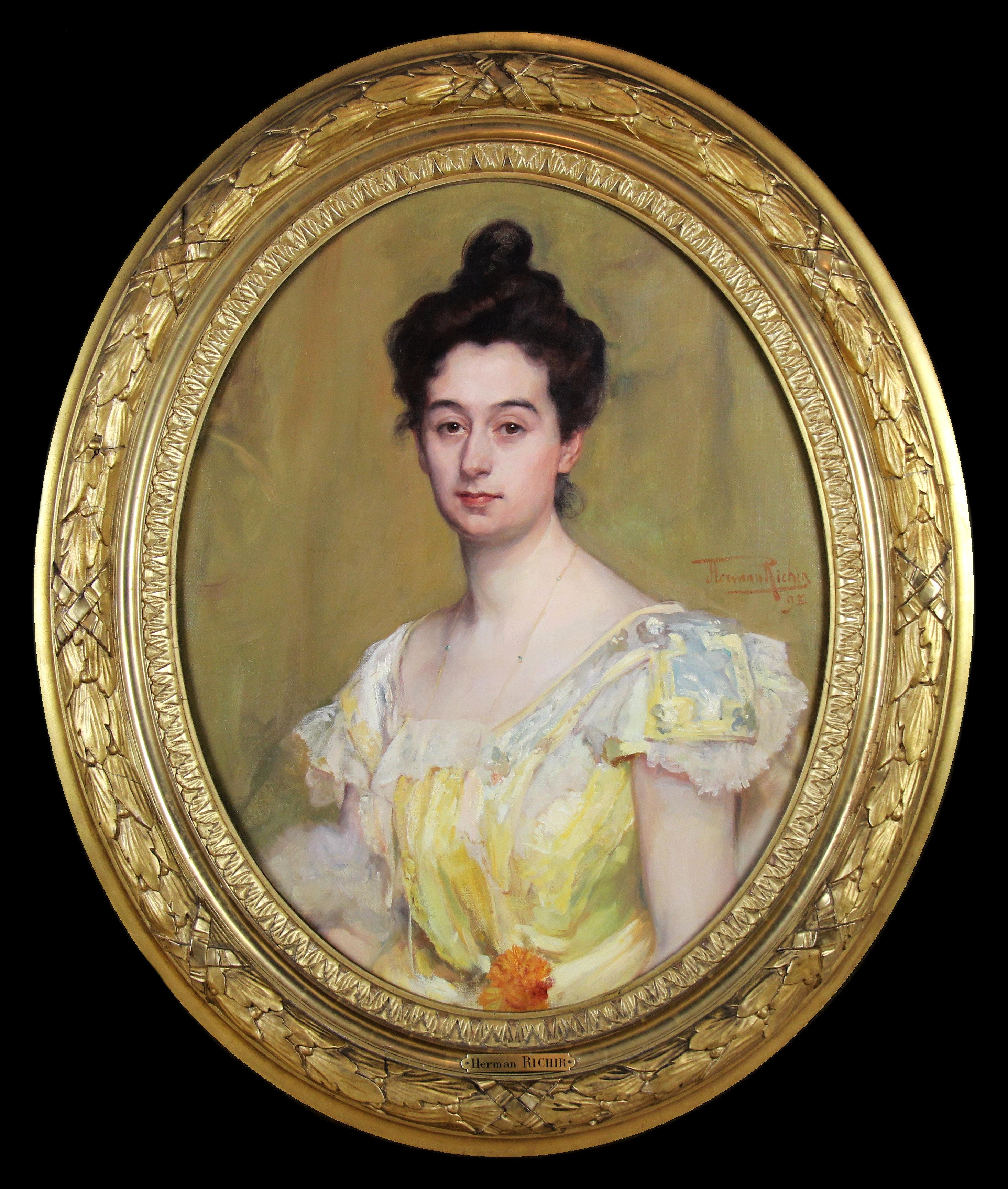 Herman Richir ( 1866-1942 ) famoso artista belga , ritratto di Mme Henroz Simonis

Si tratta di un bell'esempio di stile Art Nouveau, molto raro da trovare.
Il dipinto è inoltre incorniciato in una splendida cornice ovale d'epoca decorata (unica nel