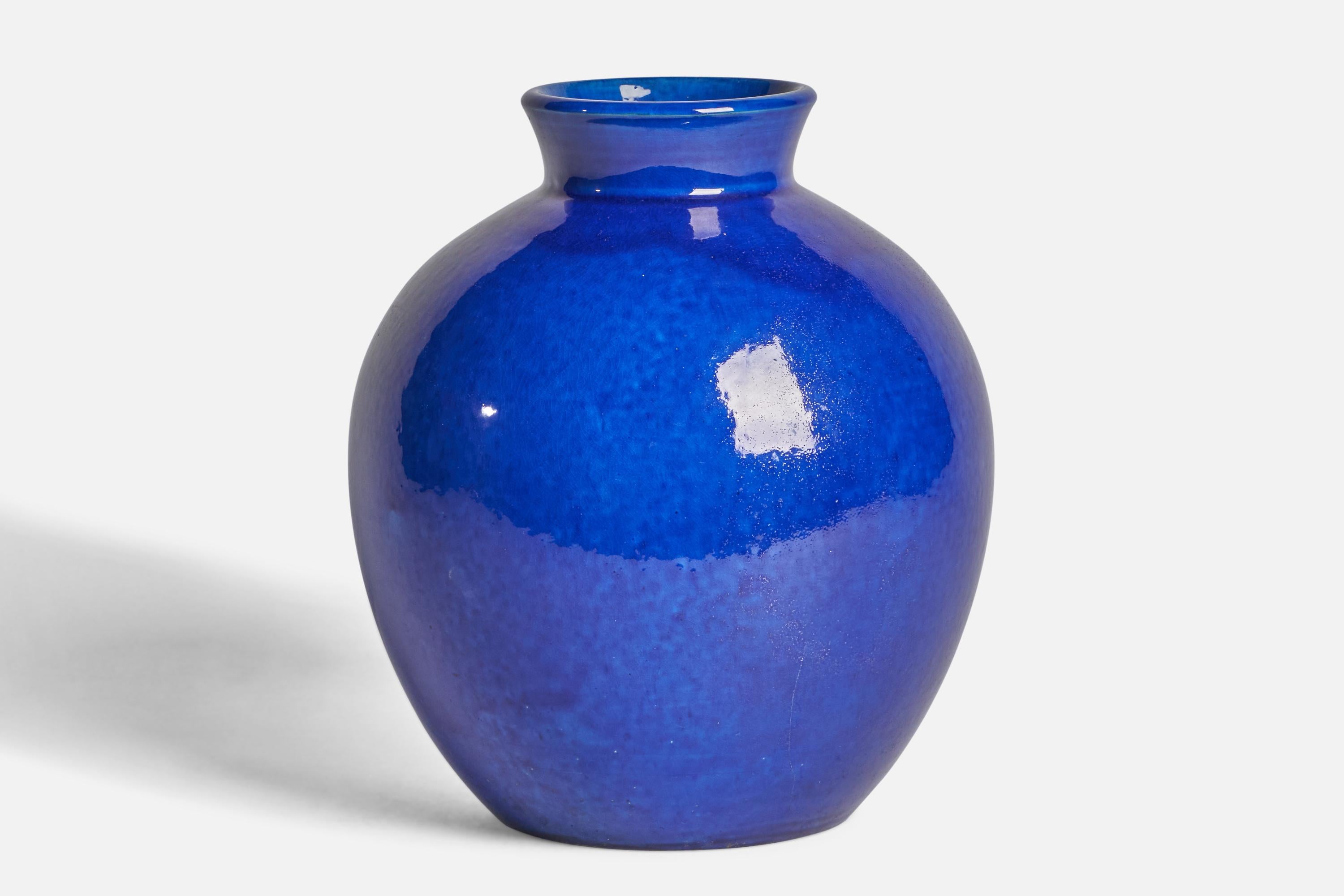A large blue-glazed earthenware vase designed and produced by Herman Kähler, Denmark, c. 1920s.

“DENMARK” stamp on bottom
