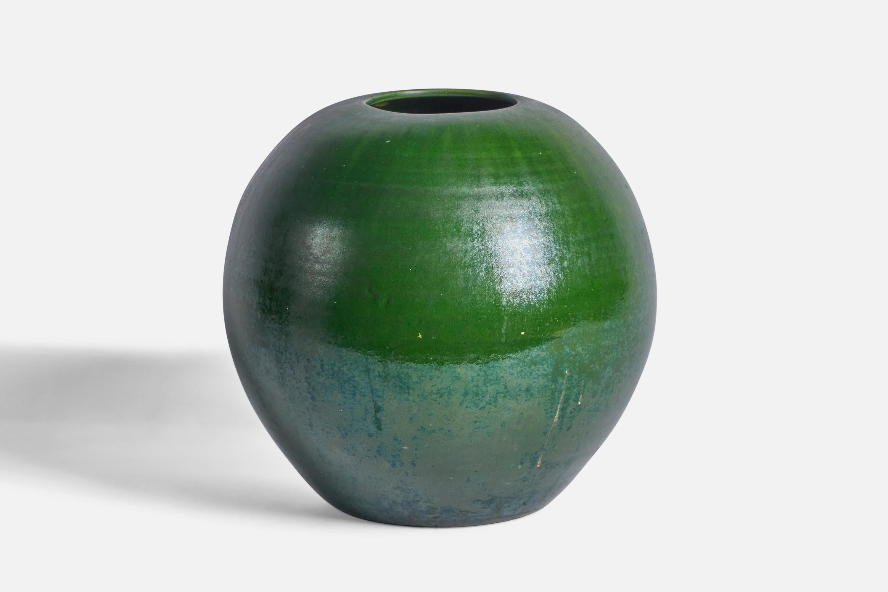 A sizeable green-glazed earthenware vase designed and produced by Herman Kähler, Denmark, c. 1920s.