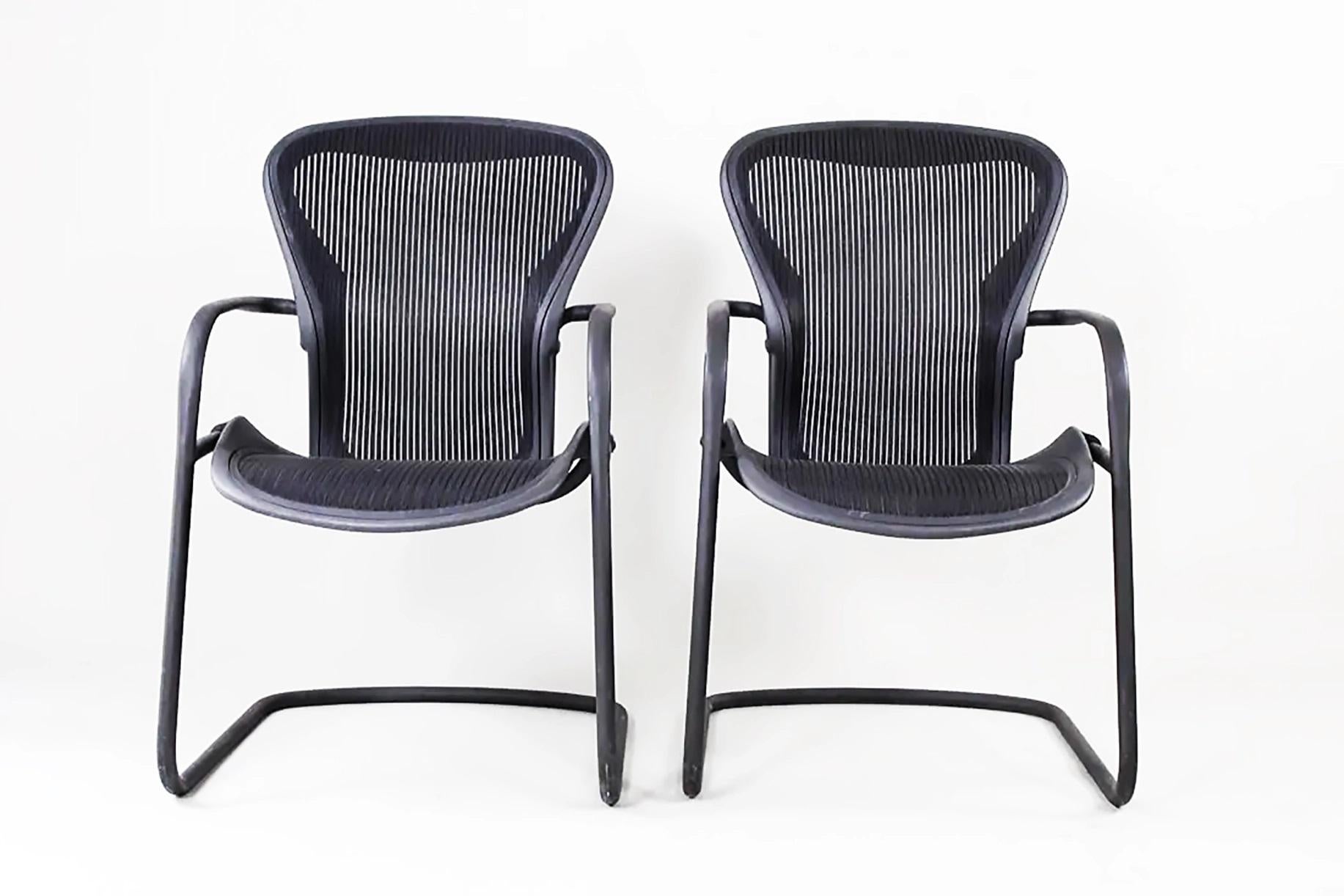 Herman Miller Aeron Ergonomic Side Chairs,  Black Tubular Metal Frames & Mesh 

Offered for sale is a pair of Herman Miller 