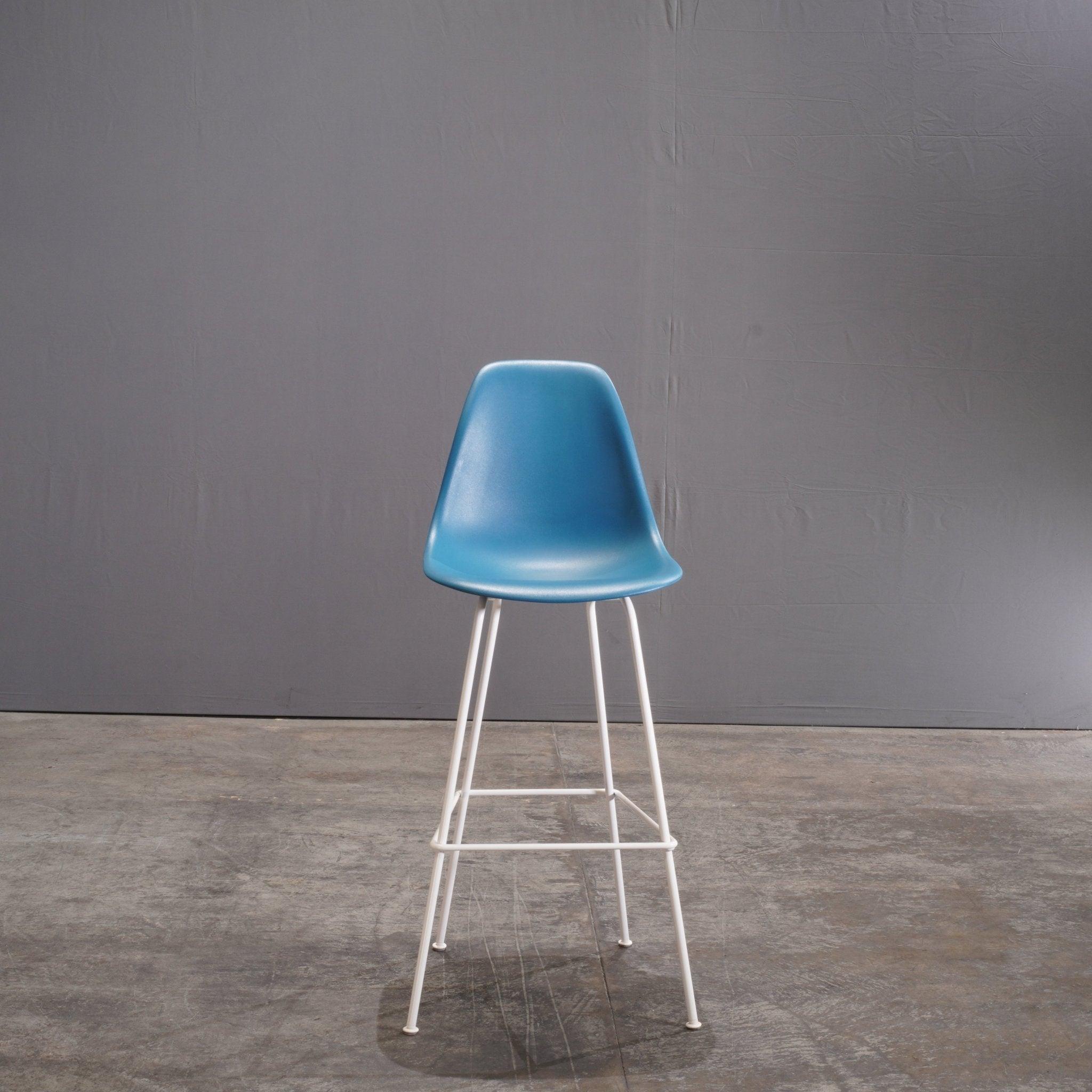 The Herman Miller Blue Moulded Plastic Stool by Charles & Ray Eames is a testament to the duo's iconic design philosophy—simple yet functional. Featuring a sleek, ergonomic seat made from durable molded plastic, this stool combines comfort with