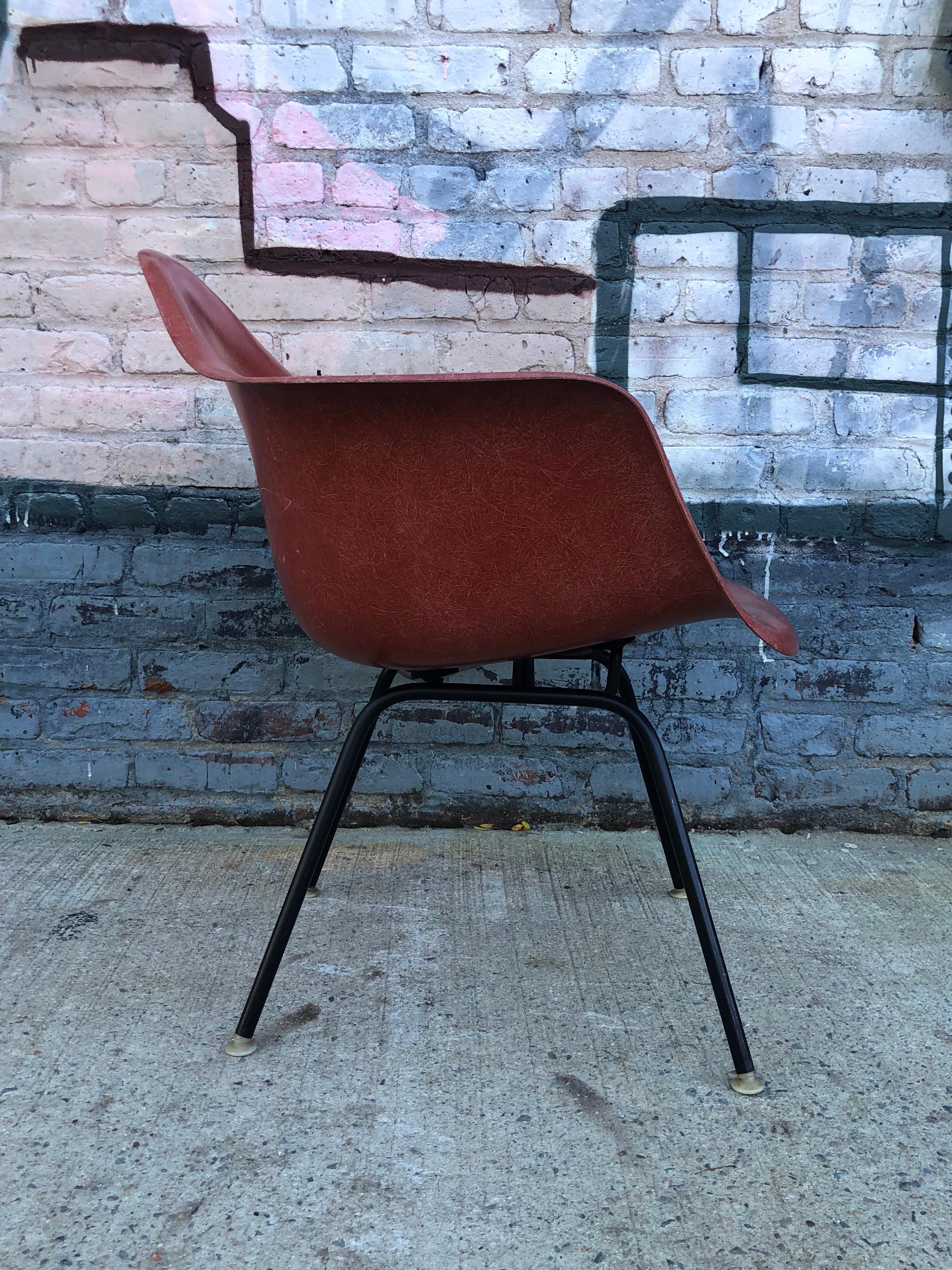 Mid-Century Modern Herman Miller Eames armchair in Terracotta