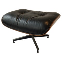 Herman Miller Eames Ottoman aus schwarzem Leder und Palisanderholz