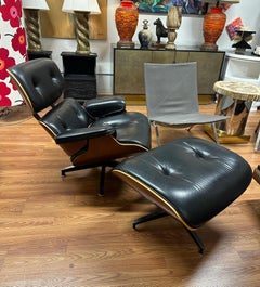 Herman Miller Eames Chair and Ottoman in Cherry Wood