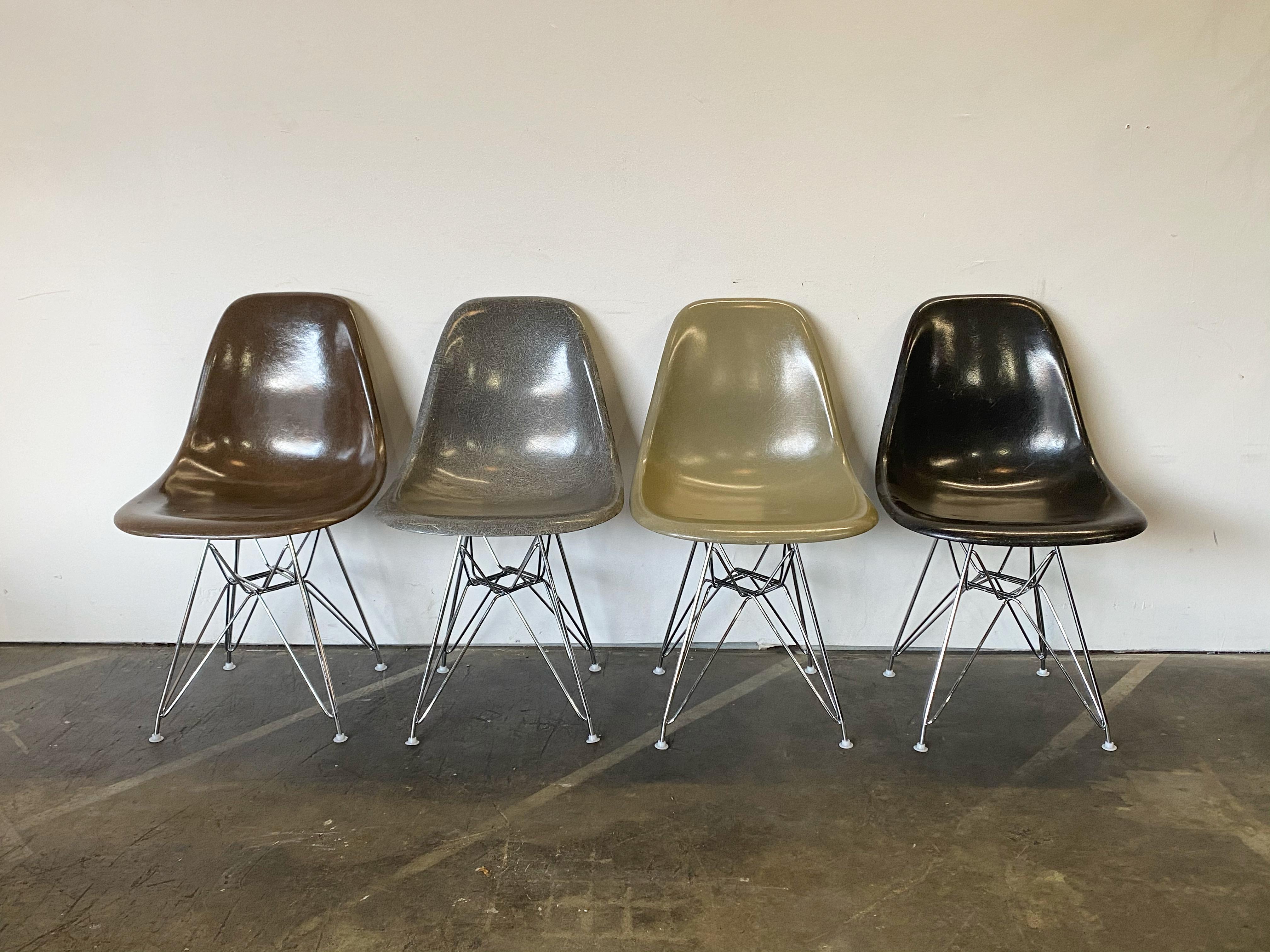 Gorgeous and unique arrangement of vintage Herman Miller Eames fiberglass shell chairs. In very good condition with even color and pronounced fiberglass strands for attractive textured appearance. Outfitted with new chrome Eiffel bases with