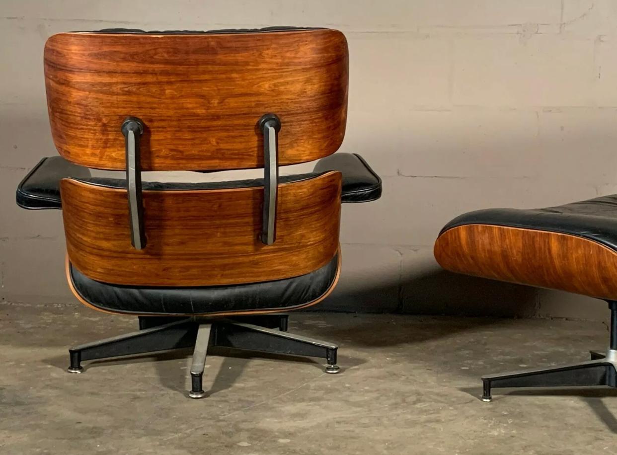 The most iconic American modernist masterpiece, the Eames lounge chair and ottoman for Herman Miller. Gorgeous wood tones with excellent black contrast. Signed and guaranteed authentic. Matching chair and ottoman have aged at the same pace and look