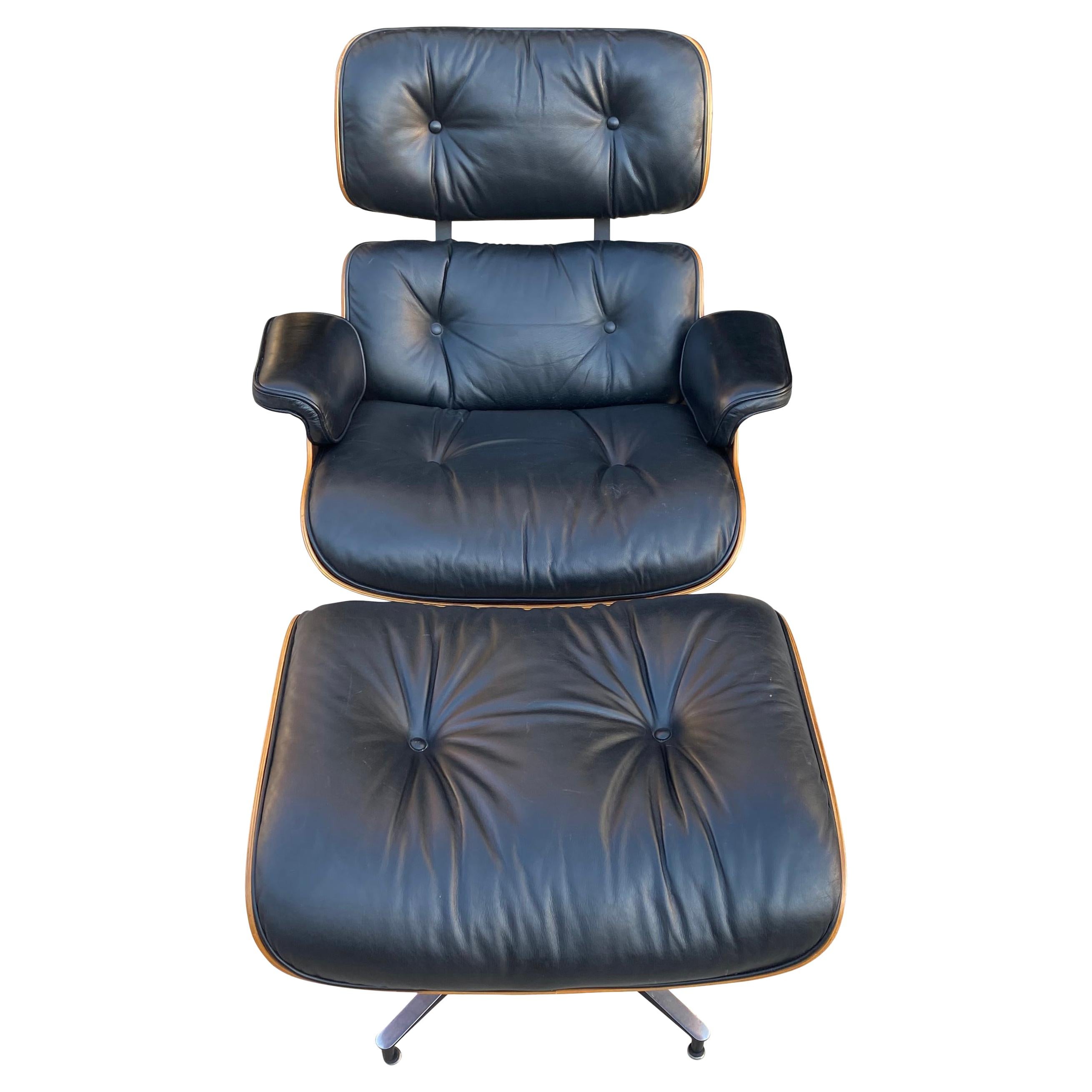 Eames Black Leather and Rio Rosewood Lounge Chair and Ottoman at 1stDibs