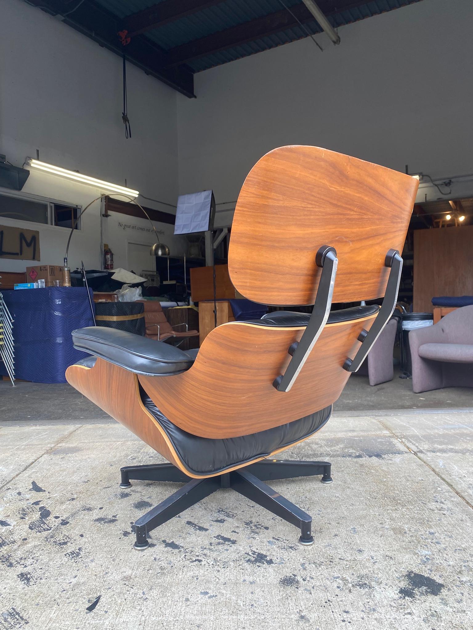 Herman Miller Eames Lounge Chair in Walnut and Black Leather 1