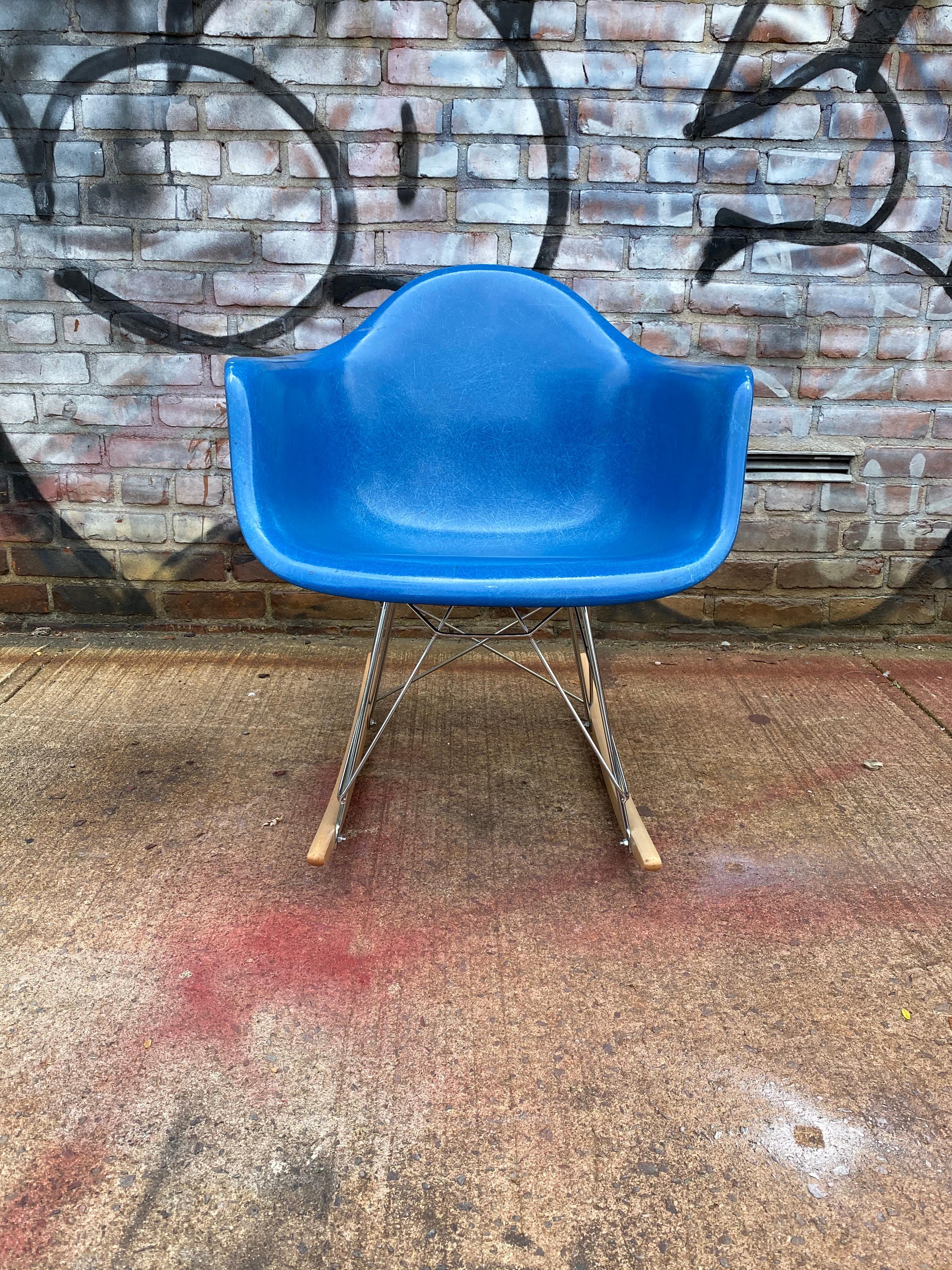 blue eames rocking chair