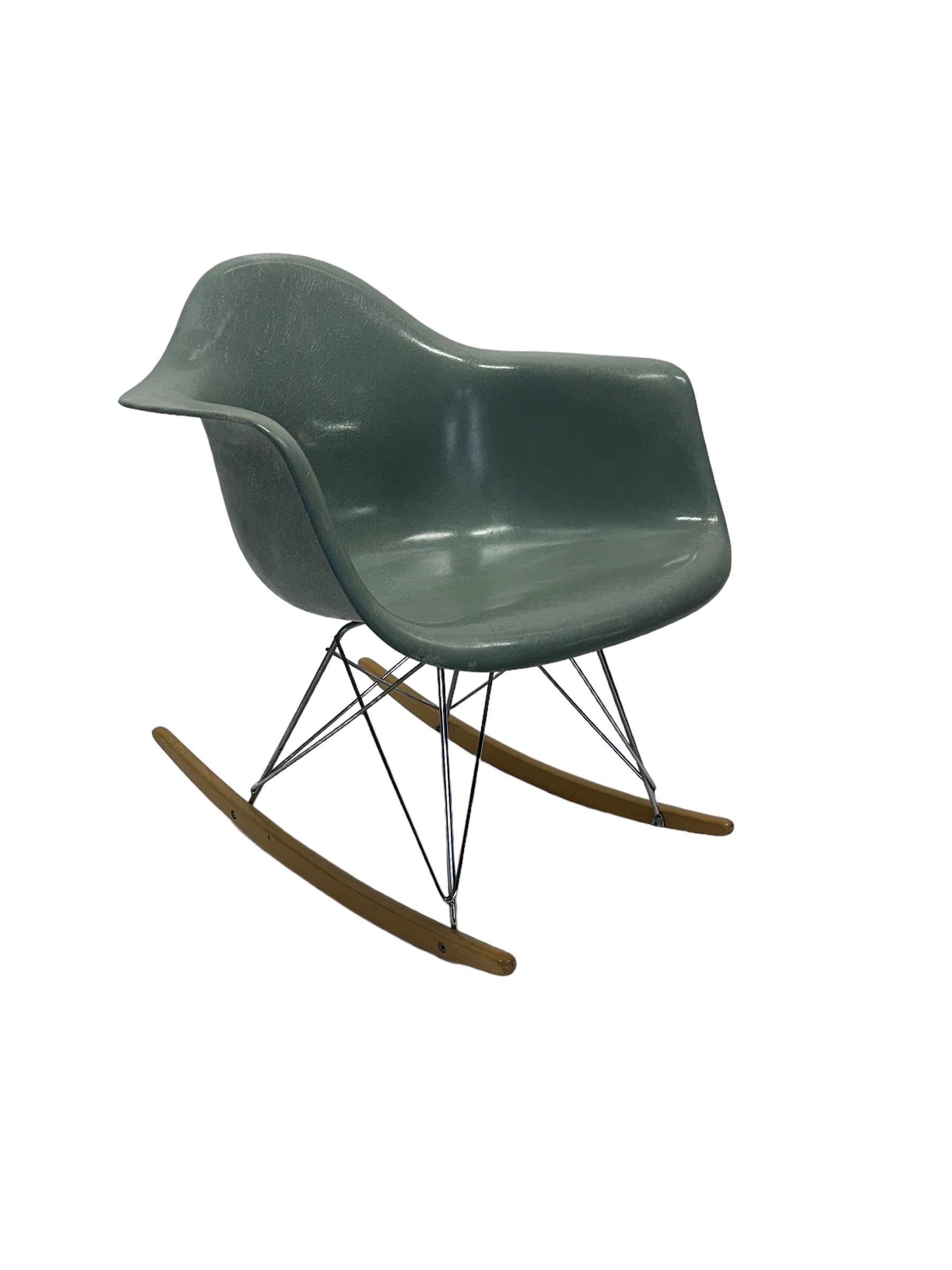 Vintage Eames molded fiberglass shell in the fairest color of them all, Seafoam Green. Original top circa late 1950s-early 1960s. On later metal and wood base, in good condition with normal markings/wear but nothing egregious. Shell signed and