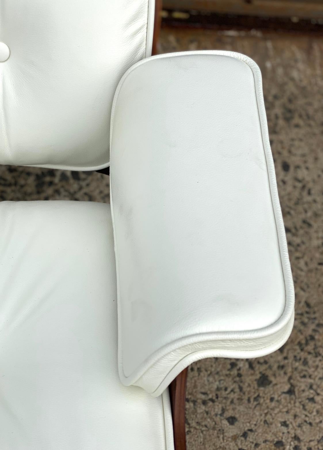 Mid-Century Modern Herman Miller Eames Rosewood Lounge Chair and Ottoman with New White Leather