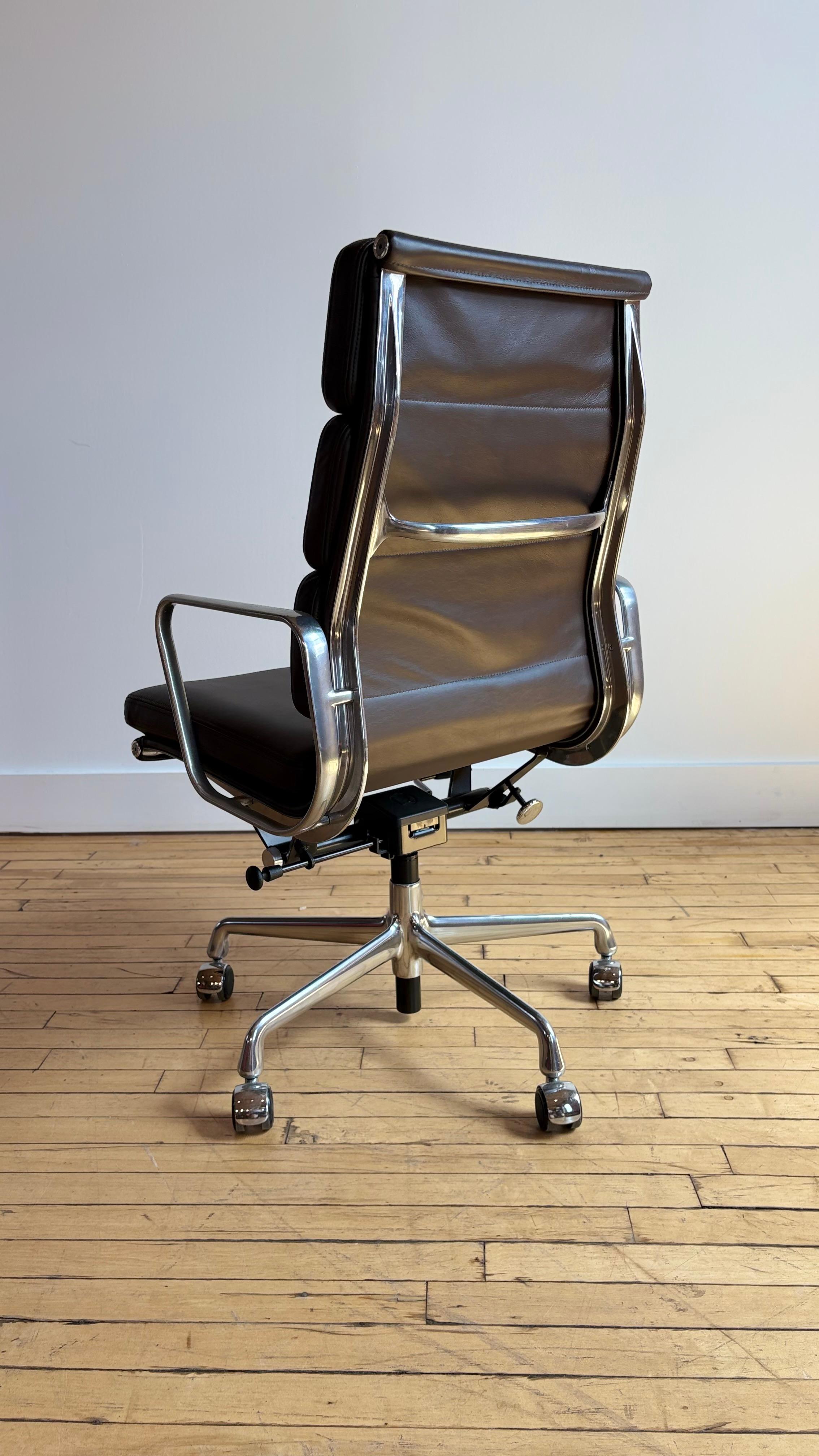 Dark brown leather Eames soft pad executive chair.

Extremely comfortable.

Four available.

Ships from Philadelphia. 

Very good overall condition.