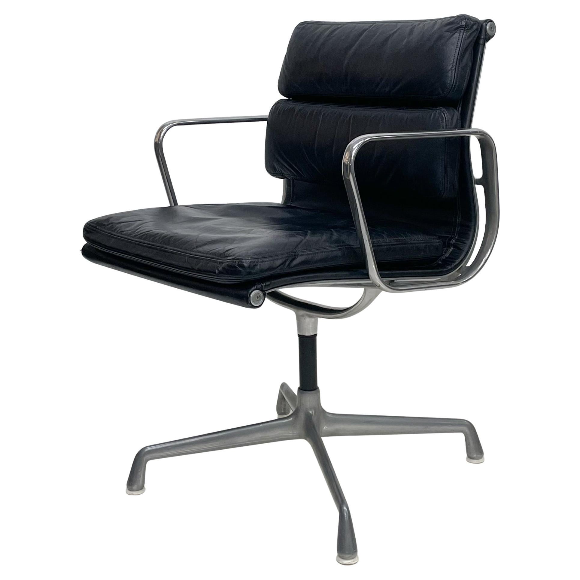 Eames soft pad
Original Herman Miller Eames soft pad management side office chair black leather.
Eames classic soft pad chair by Charles and Ray Eames designed 1969
Called soft pad for the aluminum group. 
Superior comfort in a collectible