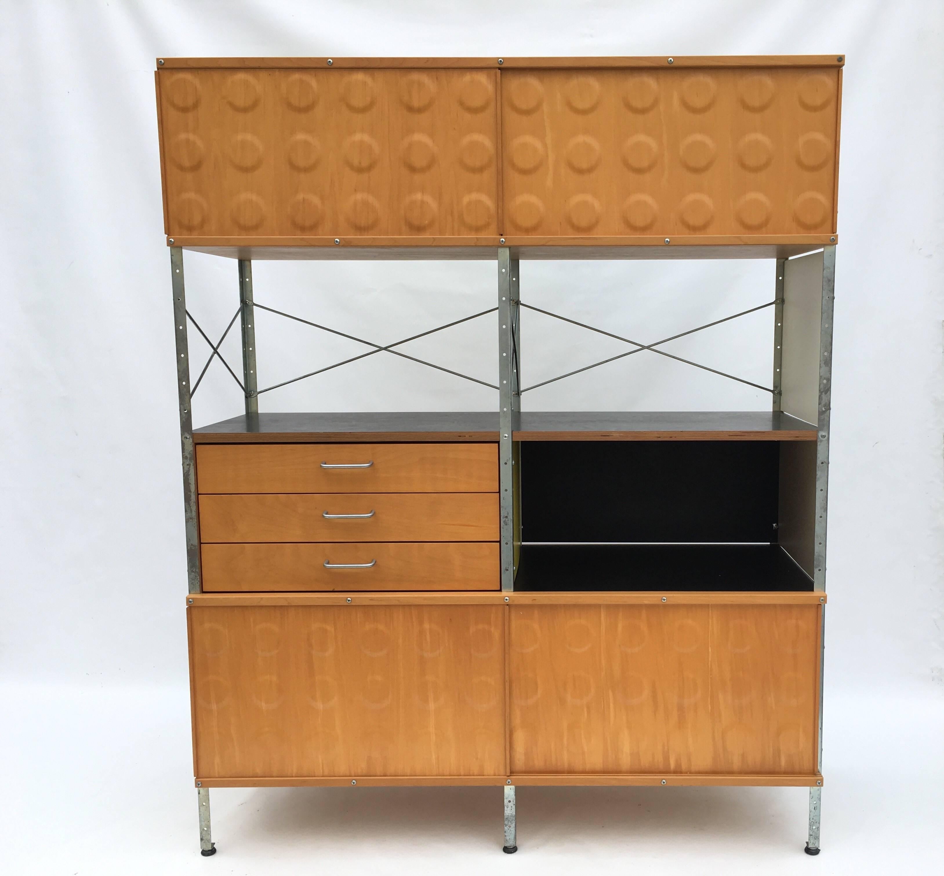 Herman Miller Eames ESU cabinet in primary colors with a nice patina. Signed. In good condition.