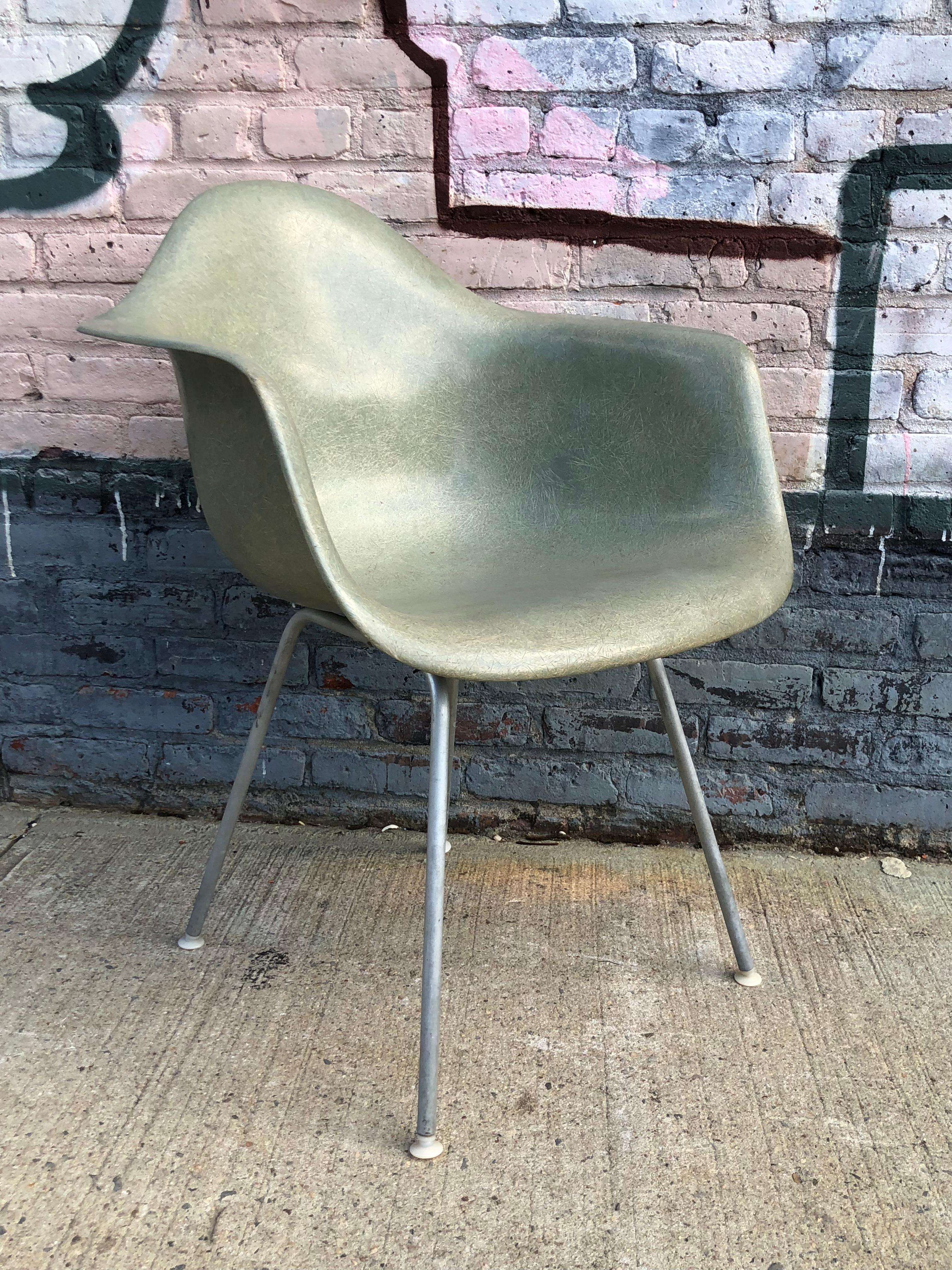 Herman Miller Eames armchair. The color is called Seafoam Green and is highly sought after by collectors. Also available on black base or rocker.