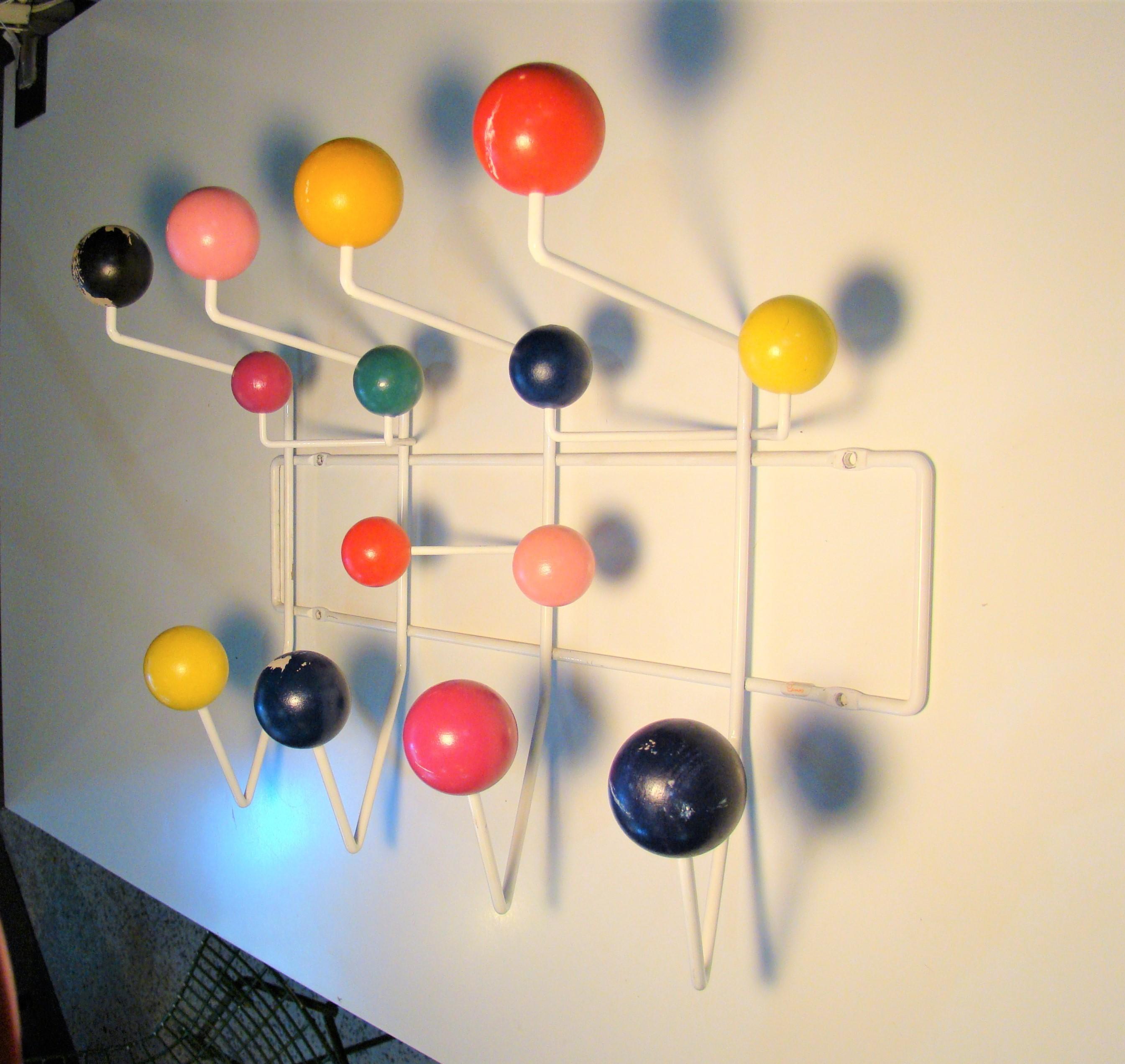 Vintage Eames Hang-It-All multicolored coat rack by Charles & Ray Eames for Herman Miller. Some wear with age as seen in the photos. Perfect addition for any Mid-Century Modern home.