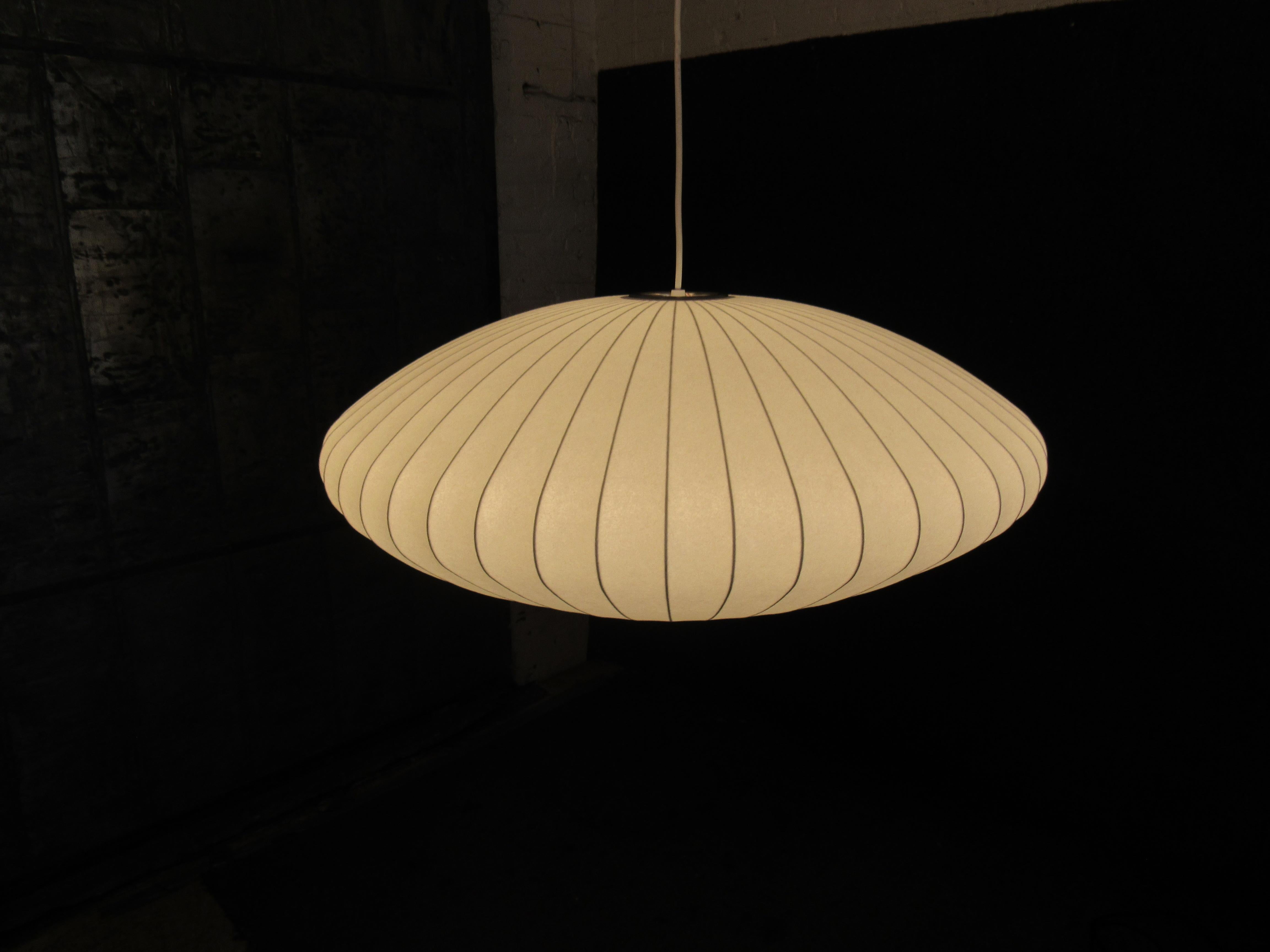 Make your lighting out of this world with the classic Gorge Nelson Saucer Bubble Pendant Lamp by Herman Miller! This modern, large model boasts an ample 35