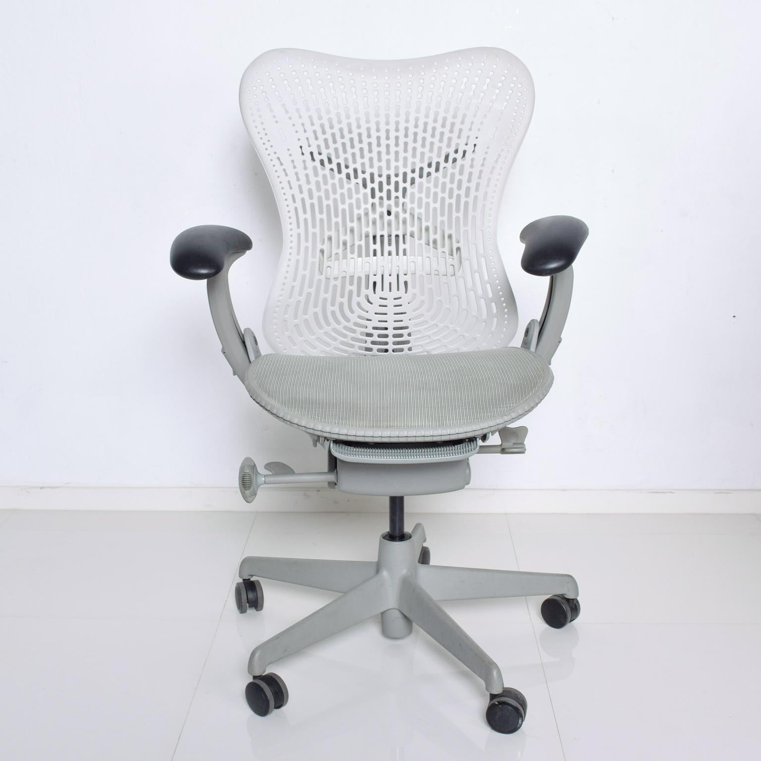 For your comfort: Herman Miller modern office chair, Mirra 2, white and gray dimensions: 41 3/4