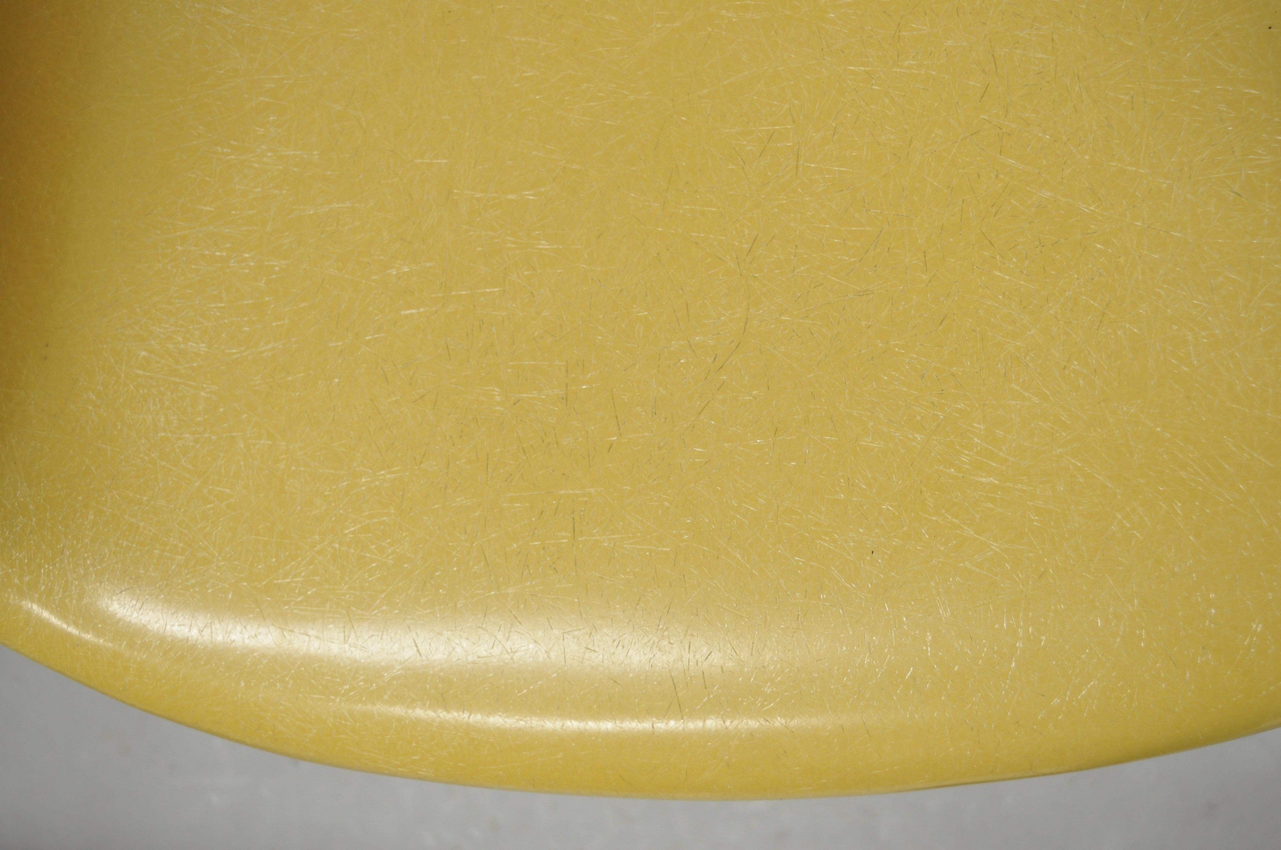 yellow herman miller chair