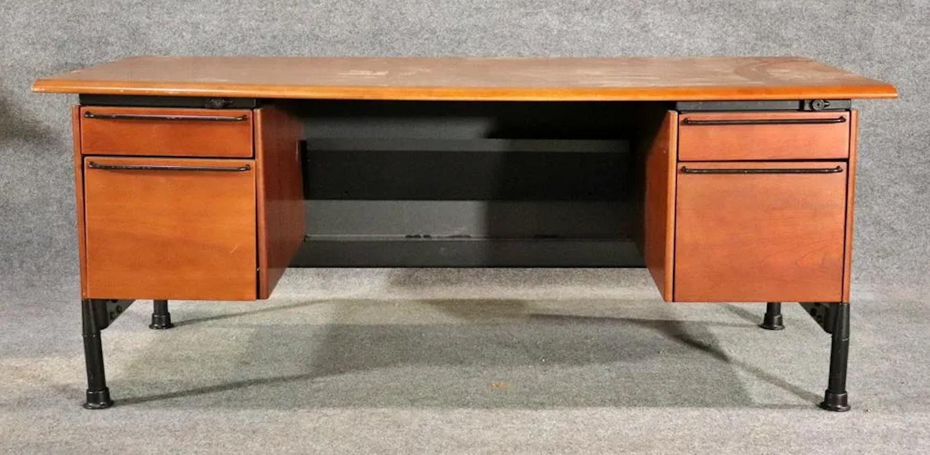 Modern office desk by Herman Miller. Made in 1993 while retaining the mid-century modern style. Large wood top with metal hardware.
Please confirm location NY or NJ.