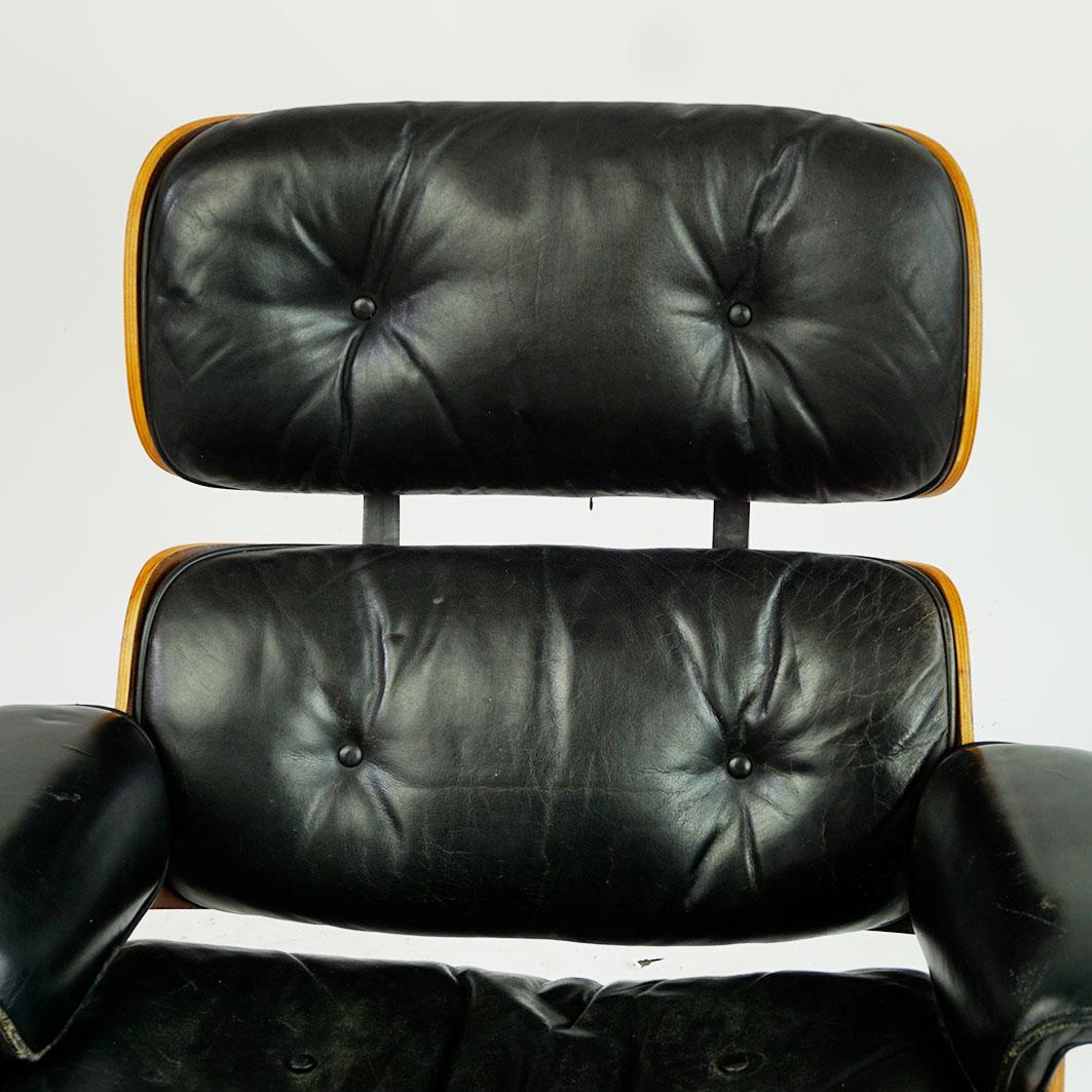 Mid-20th Century Herman Miller Rosewood and Black Leather Eames Lounge Chair and Ottoman