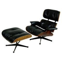 Herman Miller Rosewood and Black Leather Eames Lounge Chair and Ottoman