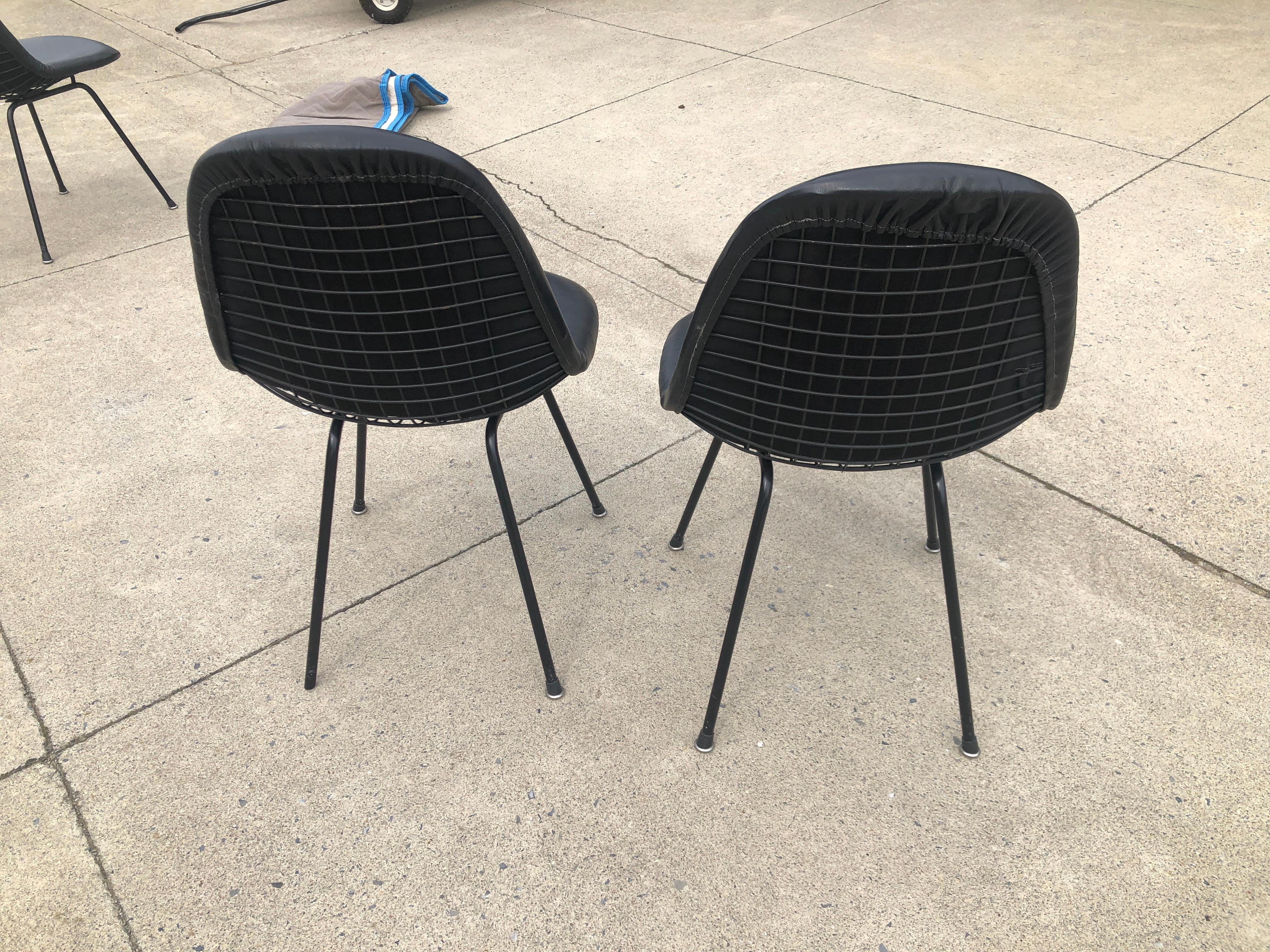 Anodized Herman Miller Vintage Eames DKX Four Chairs Black Padded Vinyl Wire Framed For Sale