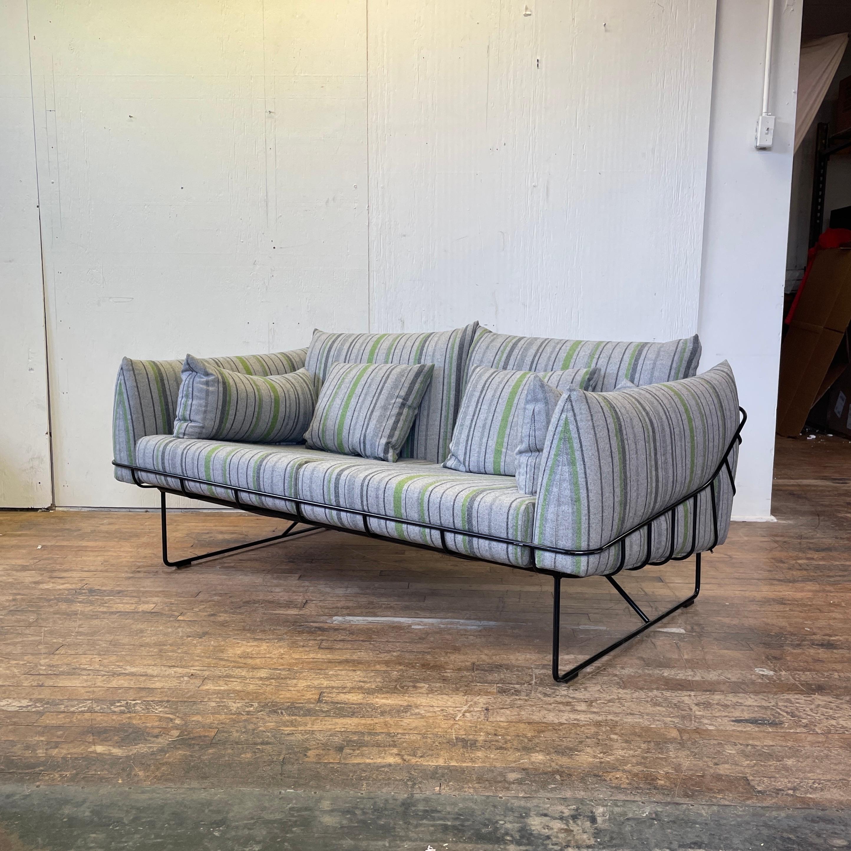 Awesome Herman Miller wireframe loveseat sofa in custom striped fabric. The fabric around the stitching on the pillows is bookmatched, showing the tremendous attention to detail that Herman Miller put into this piece! This was designed by Sam Hecht