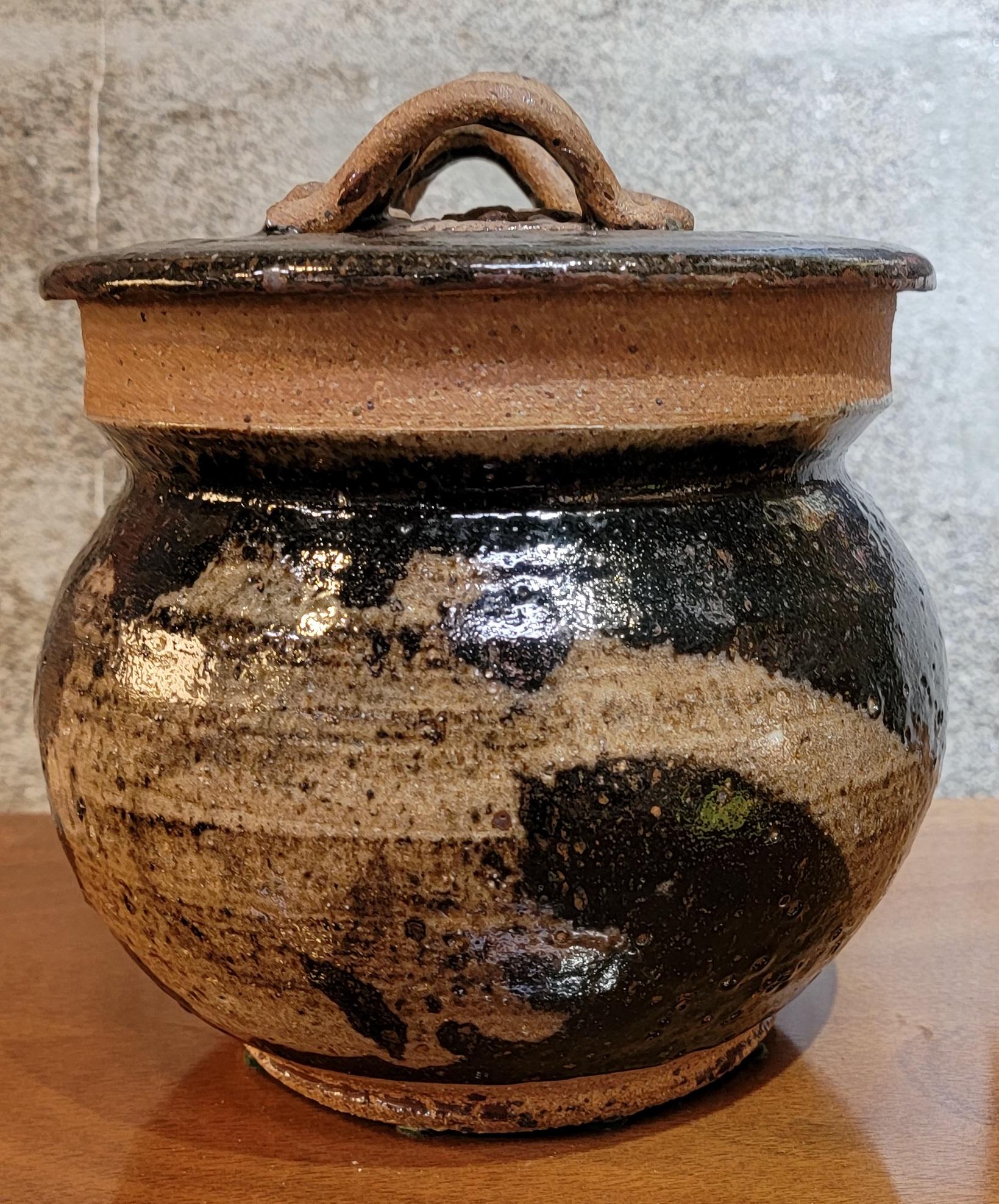 A Mid-Century Modern lidded studio pot by Herman Roderick Volz. Inscribed on base 
