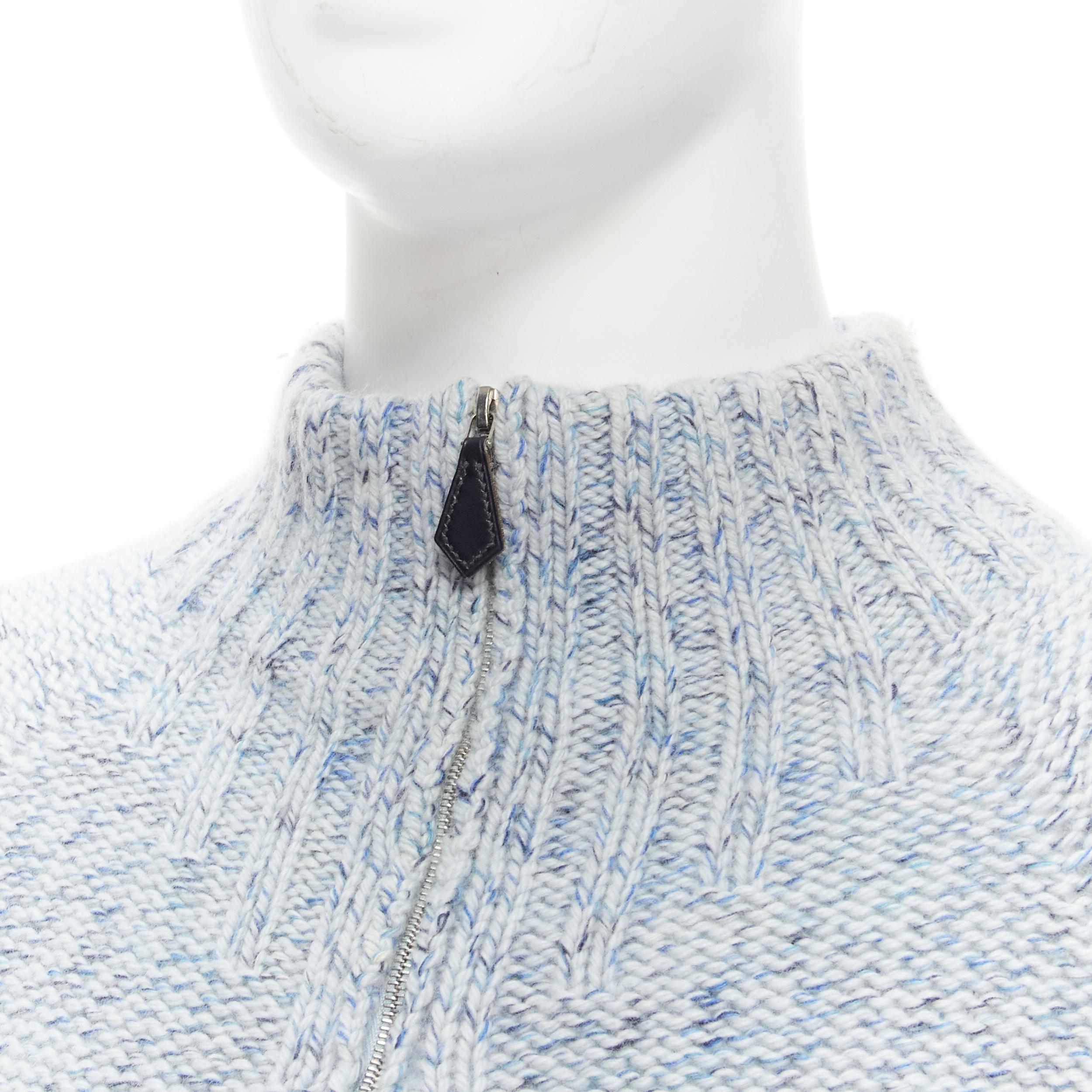 HERMES 100% cashmere blue speckle leather half zip high neck sweater L
Reference: TGAS/C01896
Brand: Hermes
Material: Cashmere, Leather
Color: Blue
Pattern: Solid
Closure: Zip
Made in: Italy

CONDITION:
Condition: Very good, this item was pre-owned