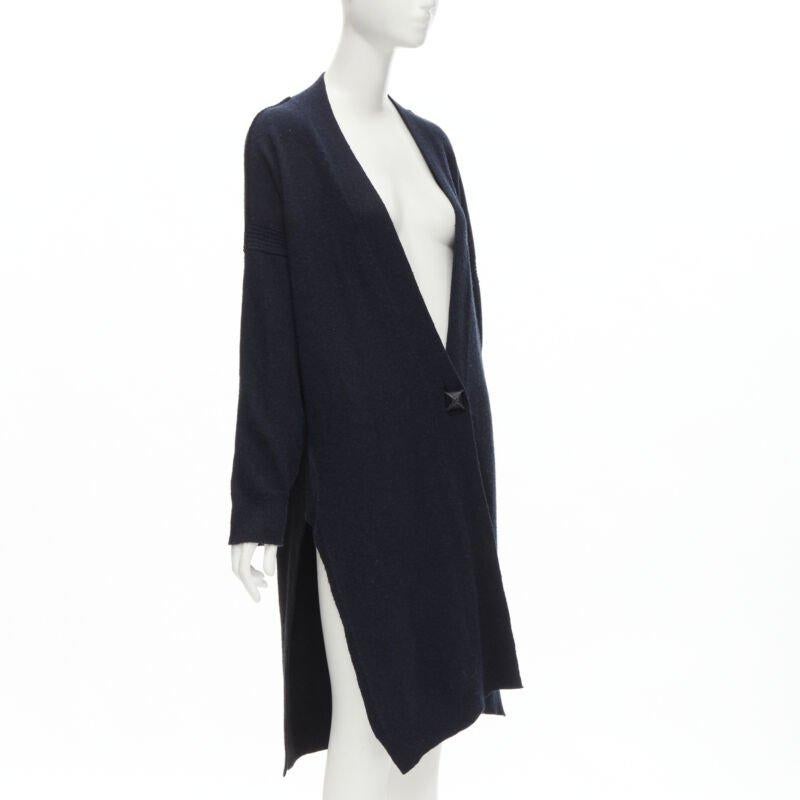 HERMES 100% cashmere Medor leather button navy black long line cardigan FR36 XS
Reference: TGAS/C01495
Brand: Hermes
Material: 100% Cashmere
Color: Navy, Black
Pattern: Solid
Closure: Button
Lining:  Unlined
Extra Details: 100% cashmere. Navy blue