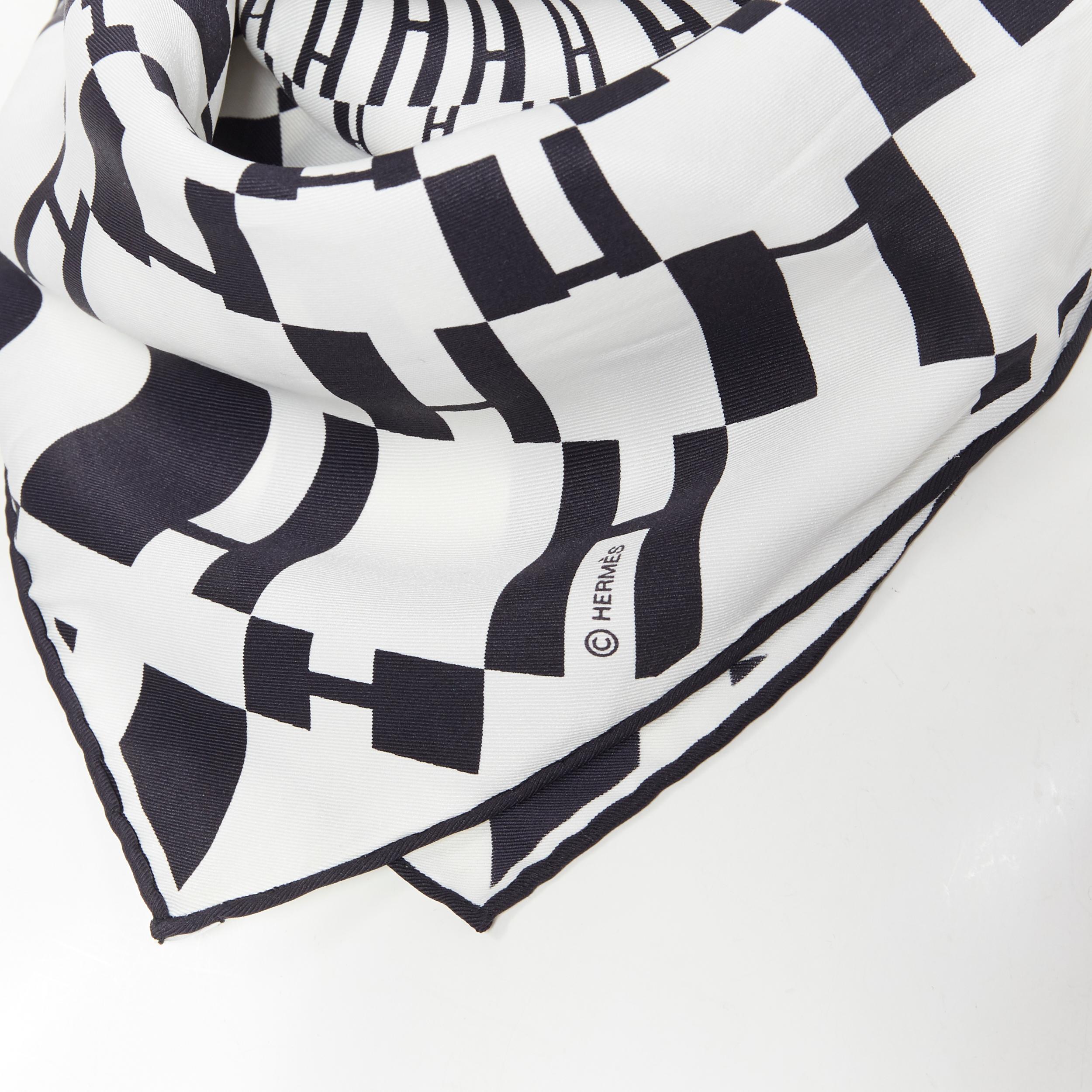 HERMES 100% silk black white geometric H silk print square handkerchief scarf
Brand: Hermes
Model Name / Style: Silk scarf
Material: Silk
Color: White
Pattern: Geometric
Made in: France

CONDITION: 
Condition: Excellent, this item was pre-owned and
