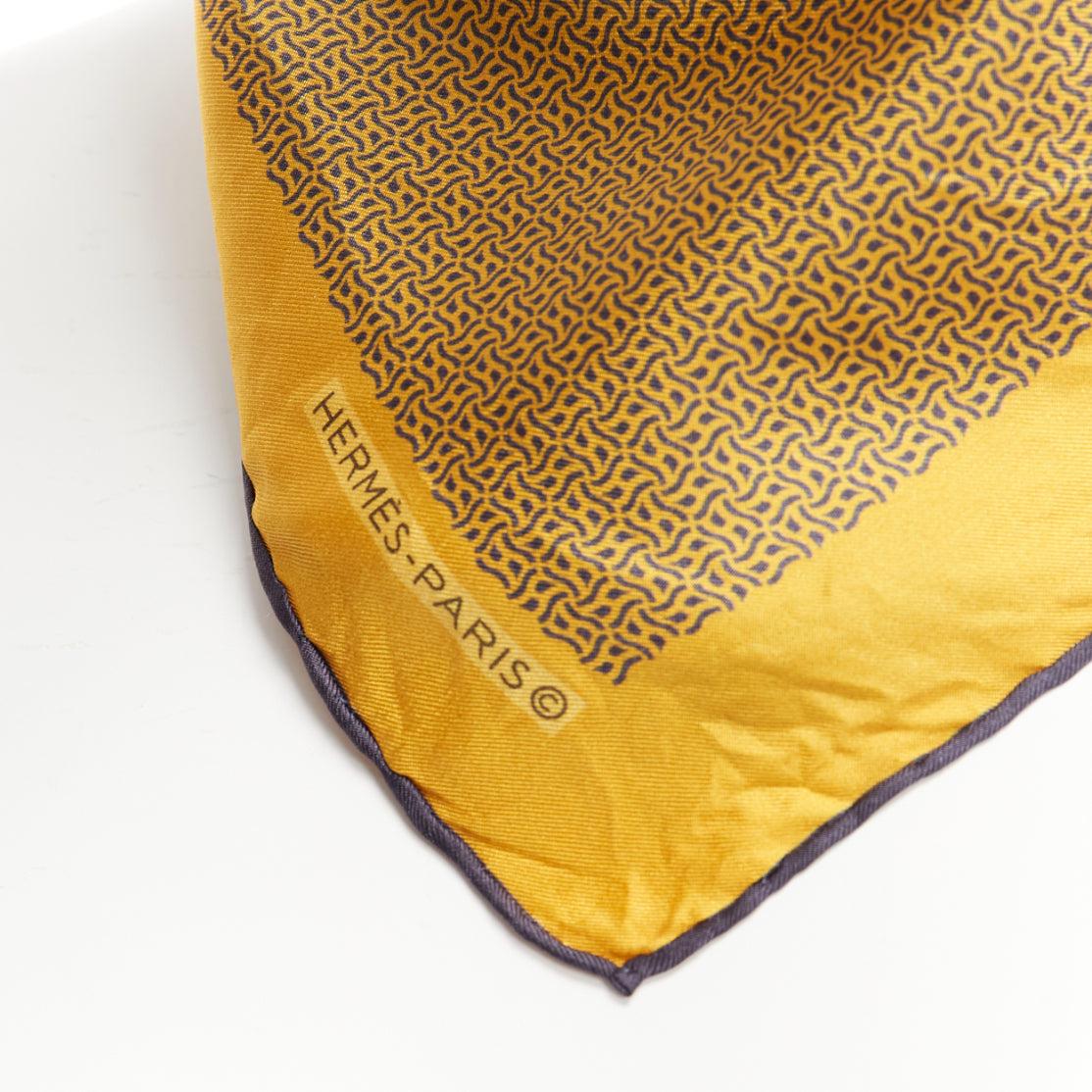 HERMES 100% silk golden yellow H logo geometric print navy trim square scarf
Reference: MLCO/A00023
Brand: Hermes
Material: Silk
Color: Yellow, Navy
Pattern: Geometric
Lining: Yellow Silk
Extra Details: Twirly H logo print.
Made in:
