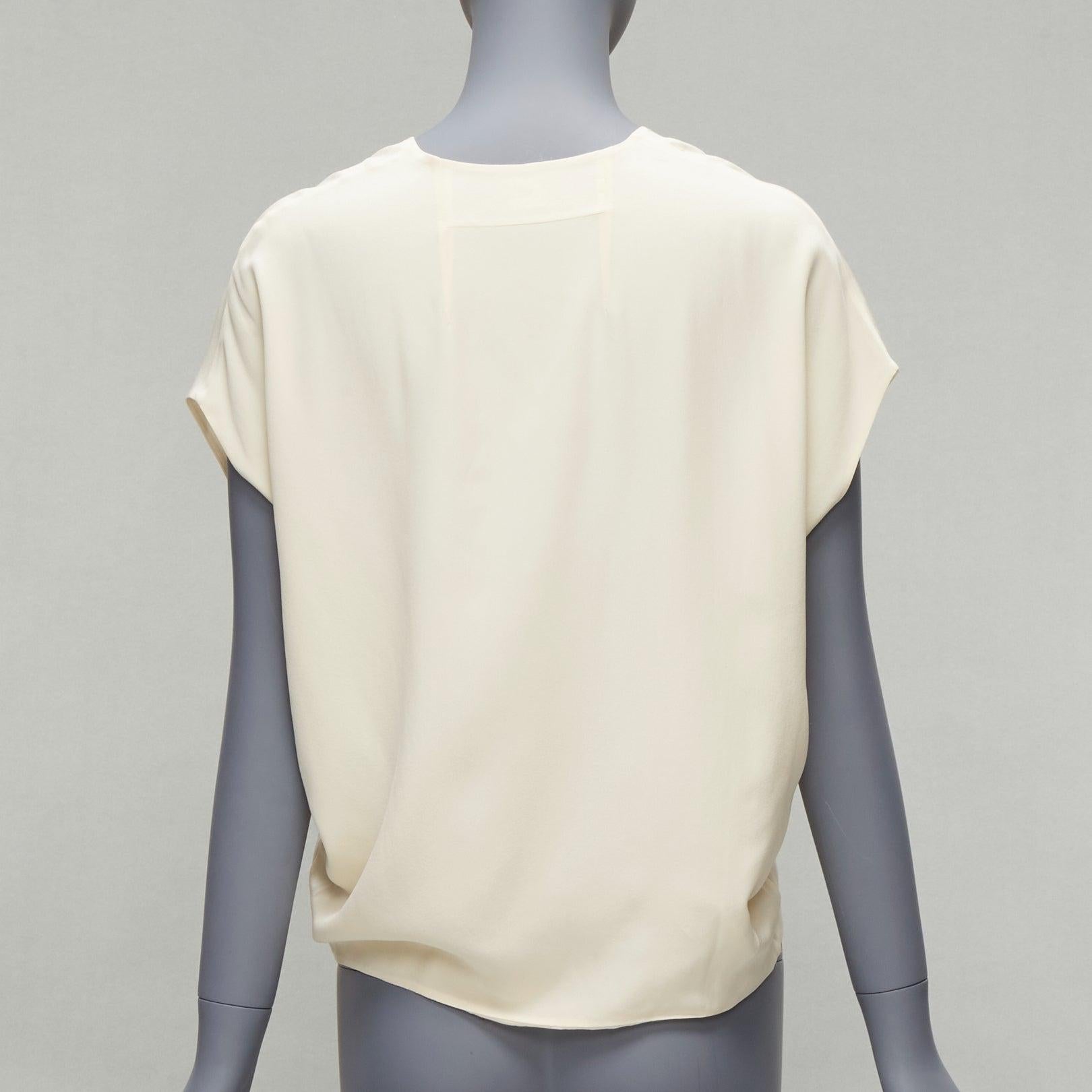 HERMES 100% Seide elfenbeinfarbenes Fledermausflügel-Top mit V-Ausschnitt und H-Logo-Stickerei FR34 XS 1