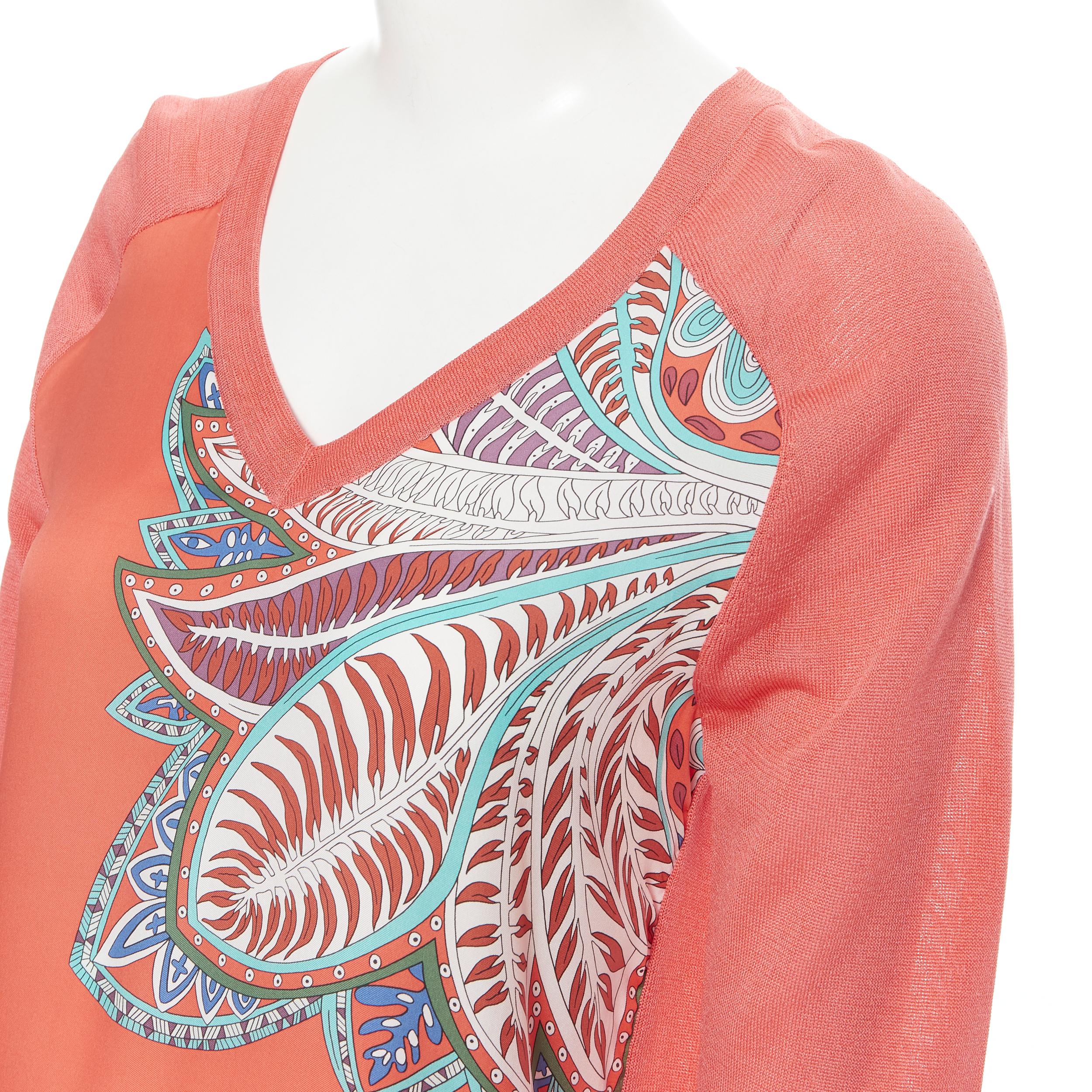 HERMES 100% silk tropical leaf print V-neck coral red long sleeve sweater FR34 
Reference: LNKO/A01724 
Brand: Hermes 
Material: Silk 
Color: Red 
Pattern: Floral 
Extra Detail: 100% silk. Tropical silk print front panel. V-neck. Silk knitted