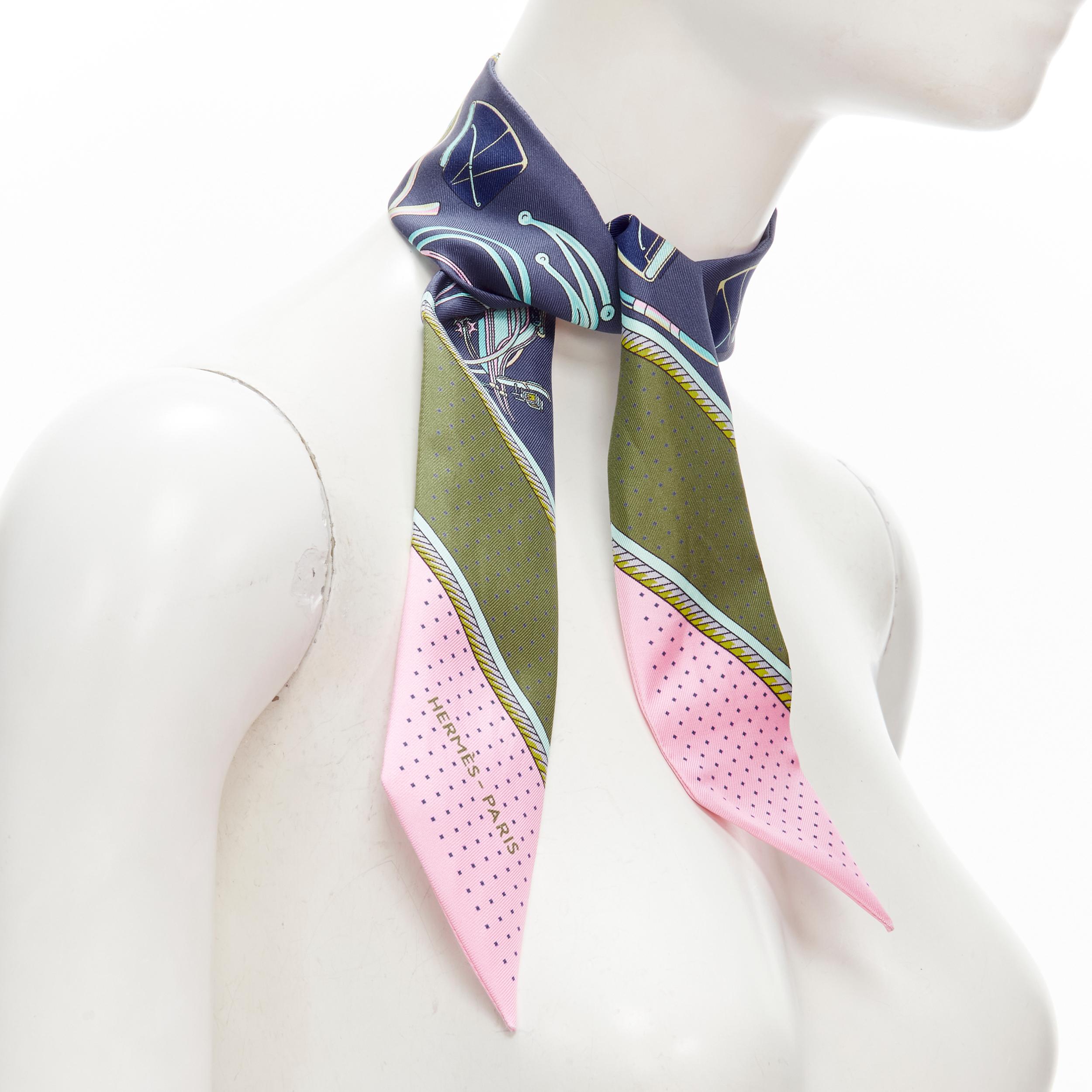 HERMES 100% silk Twilly navy blue green pink print neck tie scarf 
Reference: ANWU/A00114 
Brand: Hermes 
Material: Silk 
Color: Blue 
Pattern: Abstract 
Made in: France 


CONDITION: 
Condition: Excellent, this item was pre-owned and is in