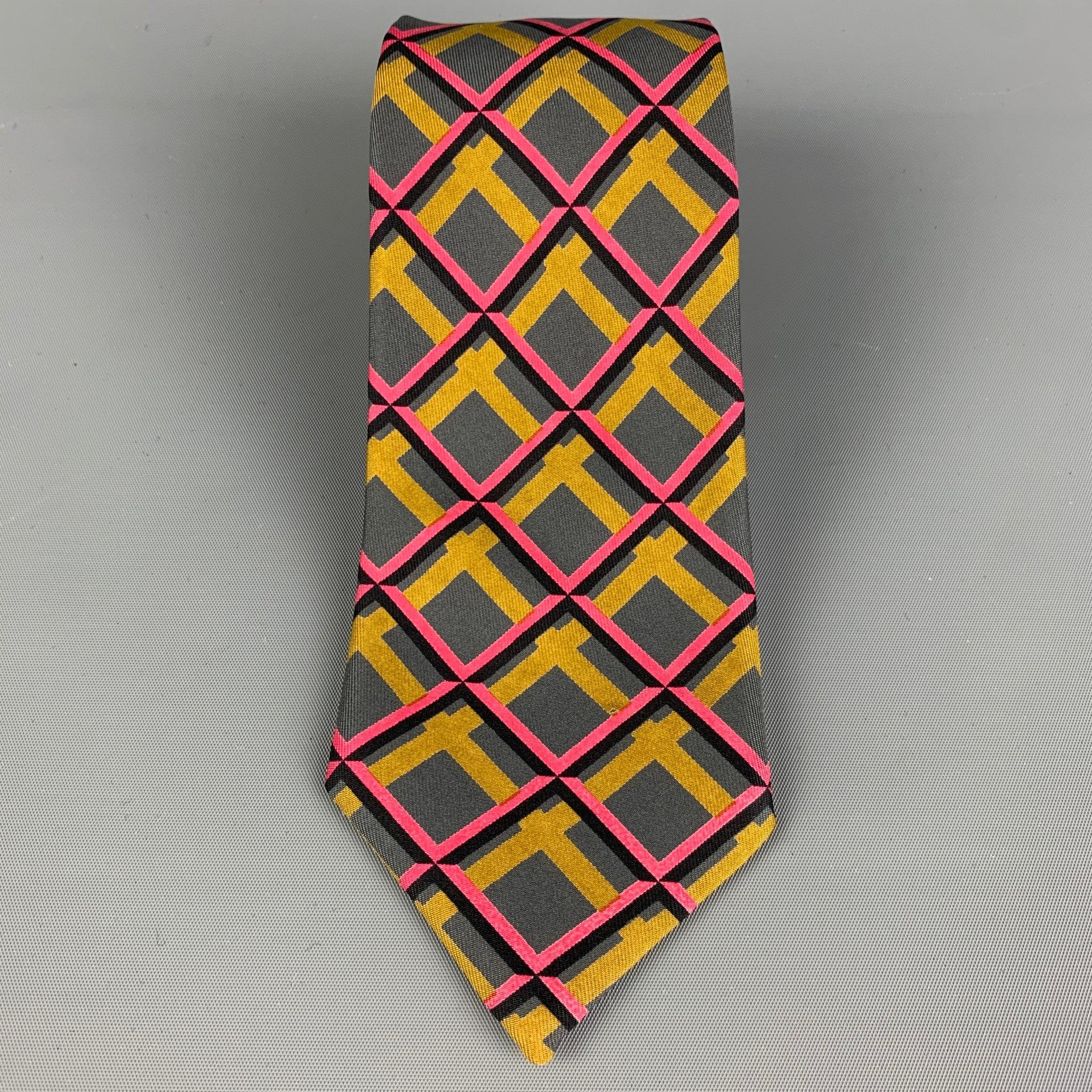 HERMES
 necktie comes in a grey & pink silk with a all over plaid print. Made in France. Very Good Pre-Owned Condition. 
 

 Marked:  161 TAWidth: 3 inches 
  
  
  
 Sui Generis Reference: 117439
 Category: Tie
 More Details
  
 Brand: HERMES
