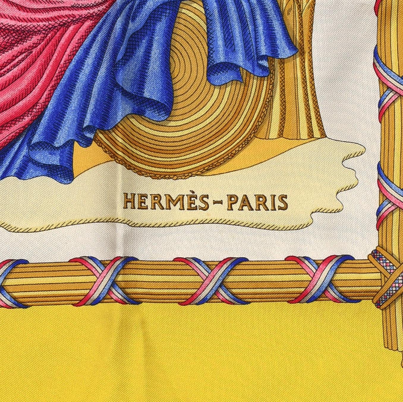 COLOR: Yellow
MATERIAL: Silk
MEASURES: 35” x 35”
COMES WITH: Box
CONDITION: Good - light stains and pulls on fabric.

Made in France