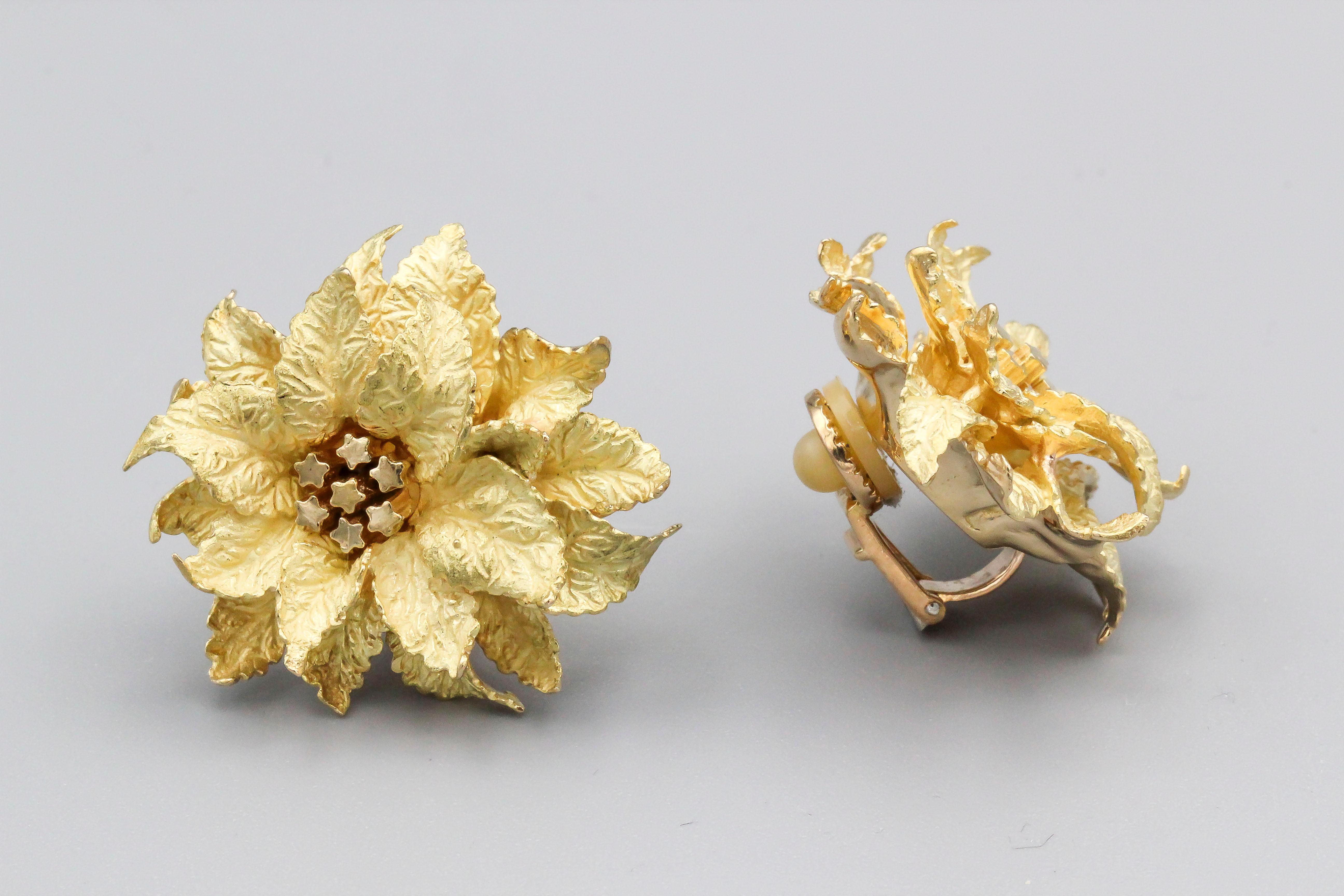 Fine 18K yellow gold earrings by Hermes. They resemble flowers with several small stars coming out of the middle. Circa 1970s.

Hallmarks: Hermes Paris, French 18K gold assay mark.