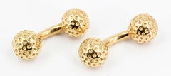 Hermès - Boutons de manchette en or 18 carats avec balle de golf et haltère