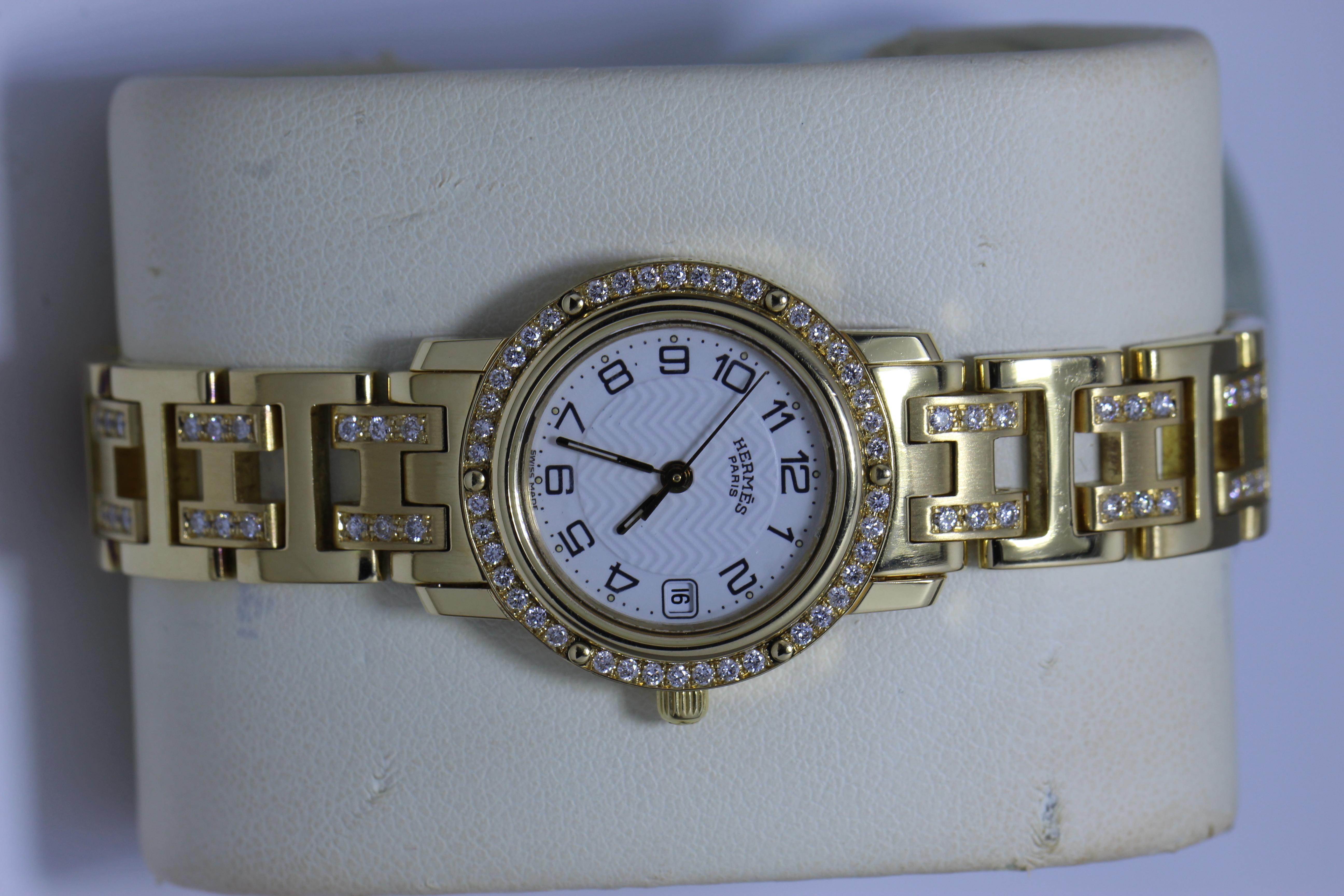 Women's Hermes 18 Karat Gold Watch with Diamond Studded Bezel and Belt For Sale