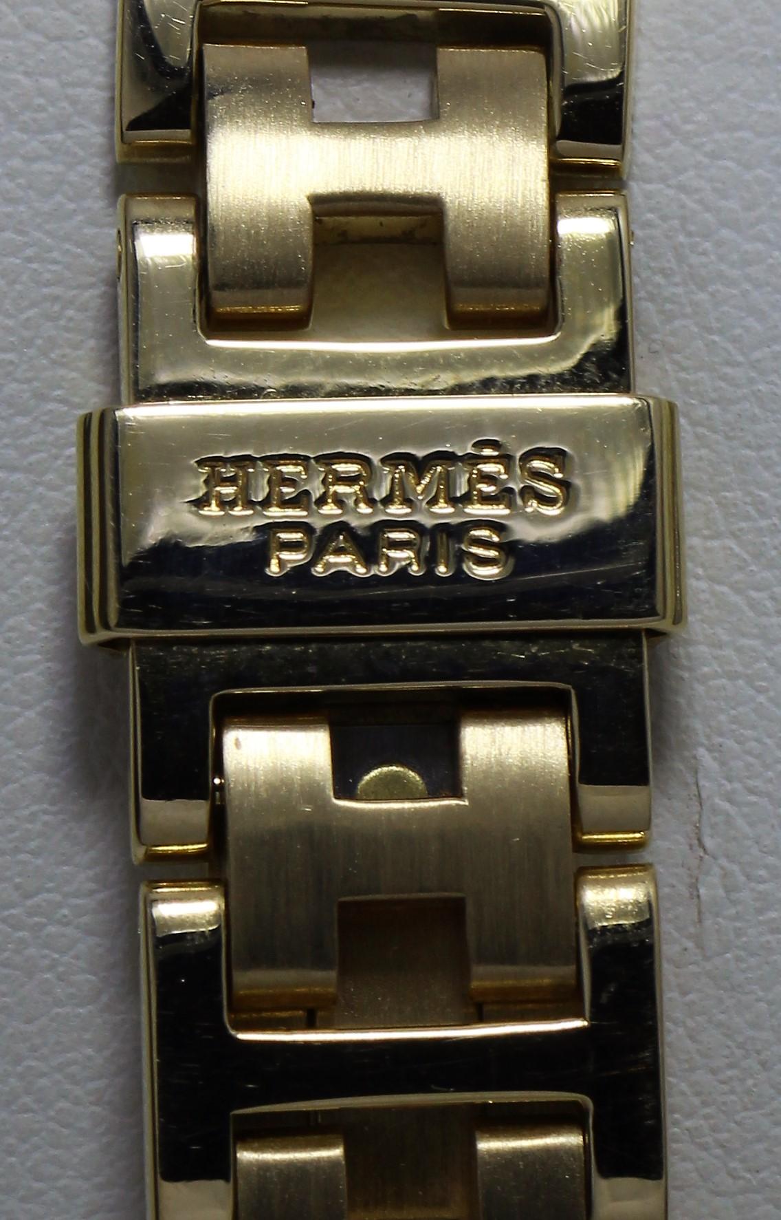 Hermes 18 Karat Gold Watch with Diamond Studded Bezel and Belt In Good Condition For Sale In New York, NY