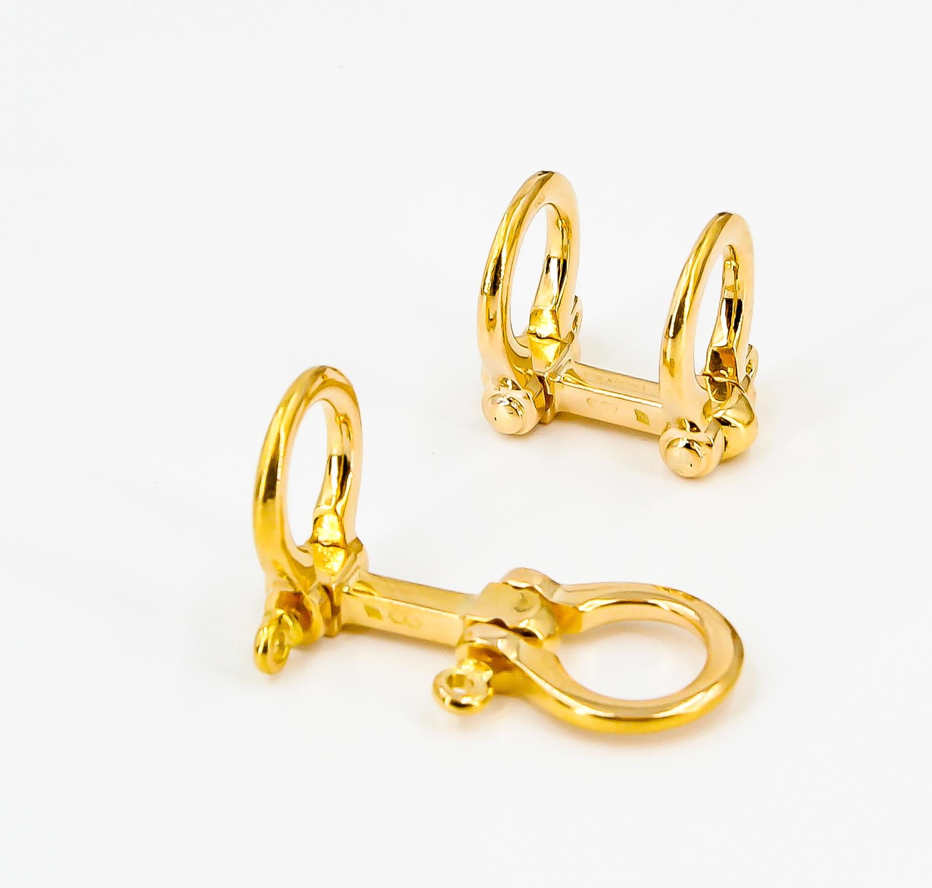 Hermès 18 Karat Yellow Gold Stirrup Folding Cufflinks In Excellent Condition In New York, NY